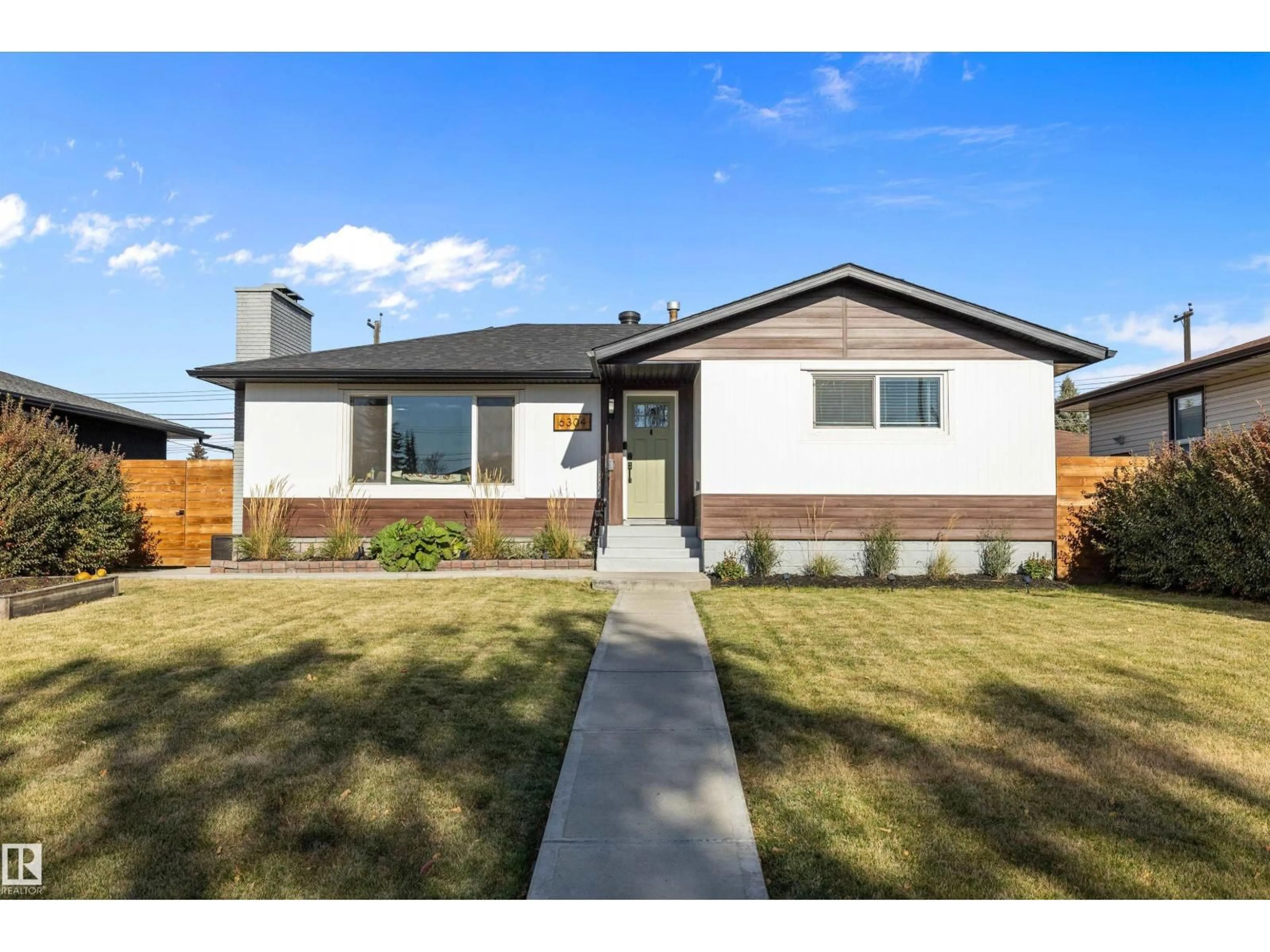 Home with brick exterior material, street for 6304 94A AV, Edmonton Alberta T6B0Y8