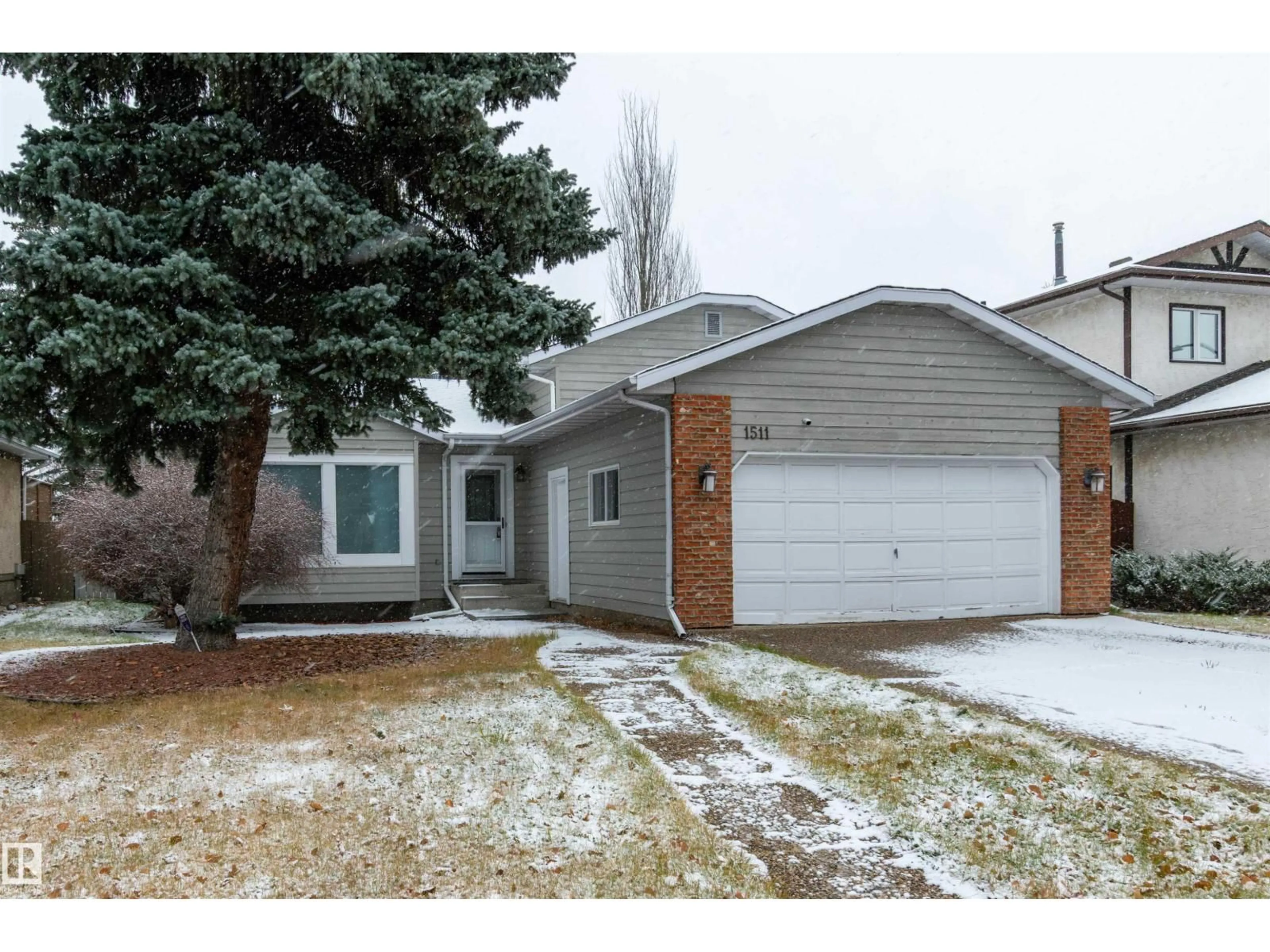 Home with vinyl exterior material, street for NW - 1511 109 ST, Edmonton Alberta T6J5W9