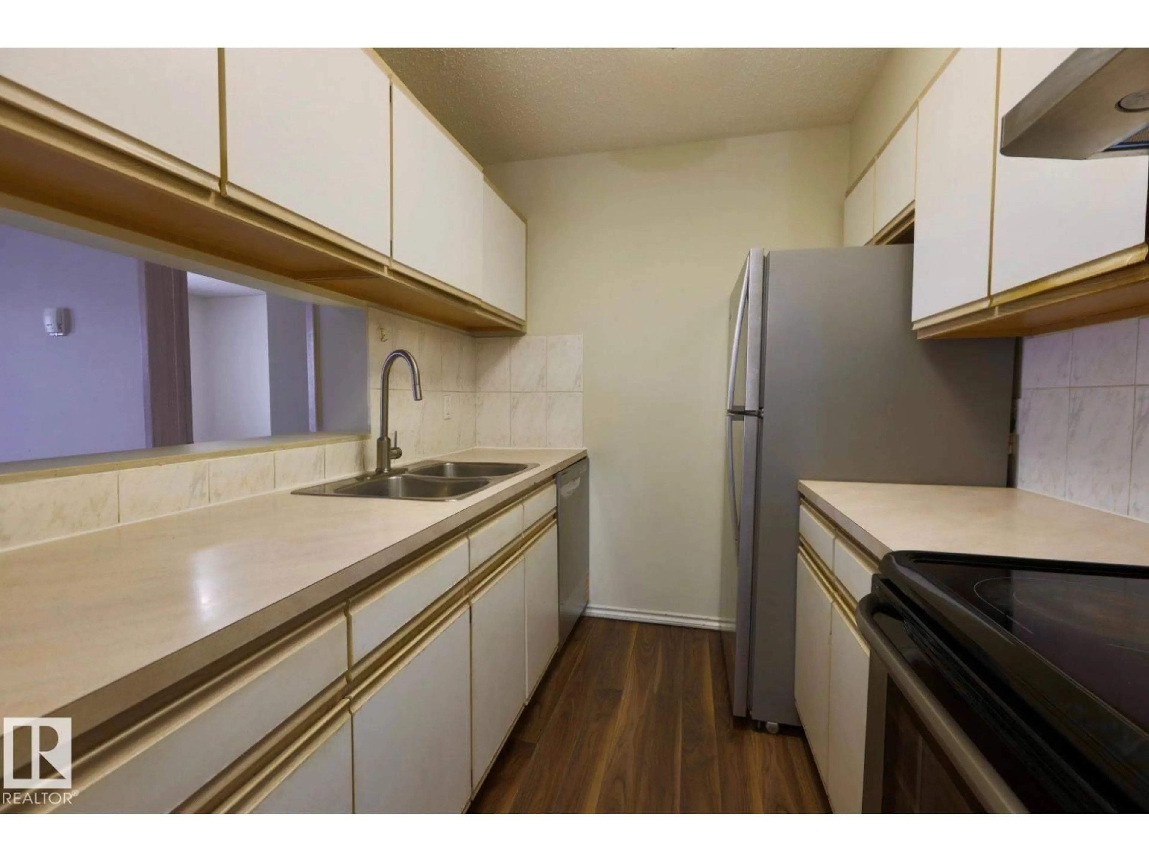 Standard kitchen, wood/laminate floor for #213 - 5065 31 AV, Edmonton Alberta T6L0A7