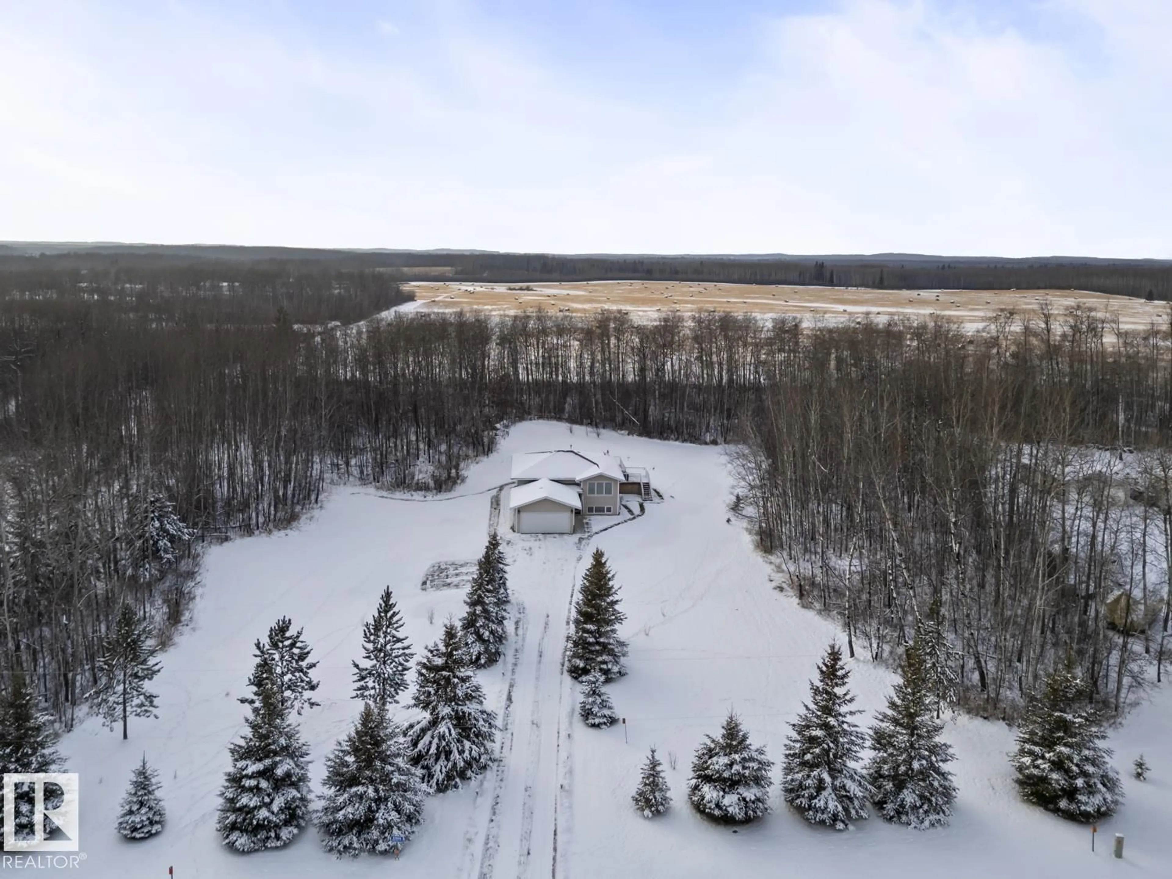 A pic from outside/outdoor area/front of a property/back of a property/a pic from drone, forest/trees view for 412 RANGE RD, Rural Bonnyville M.D. Alberta T0A0T0