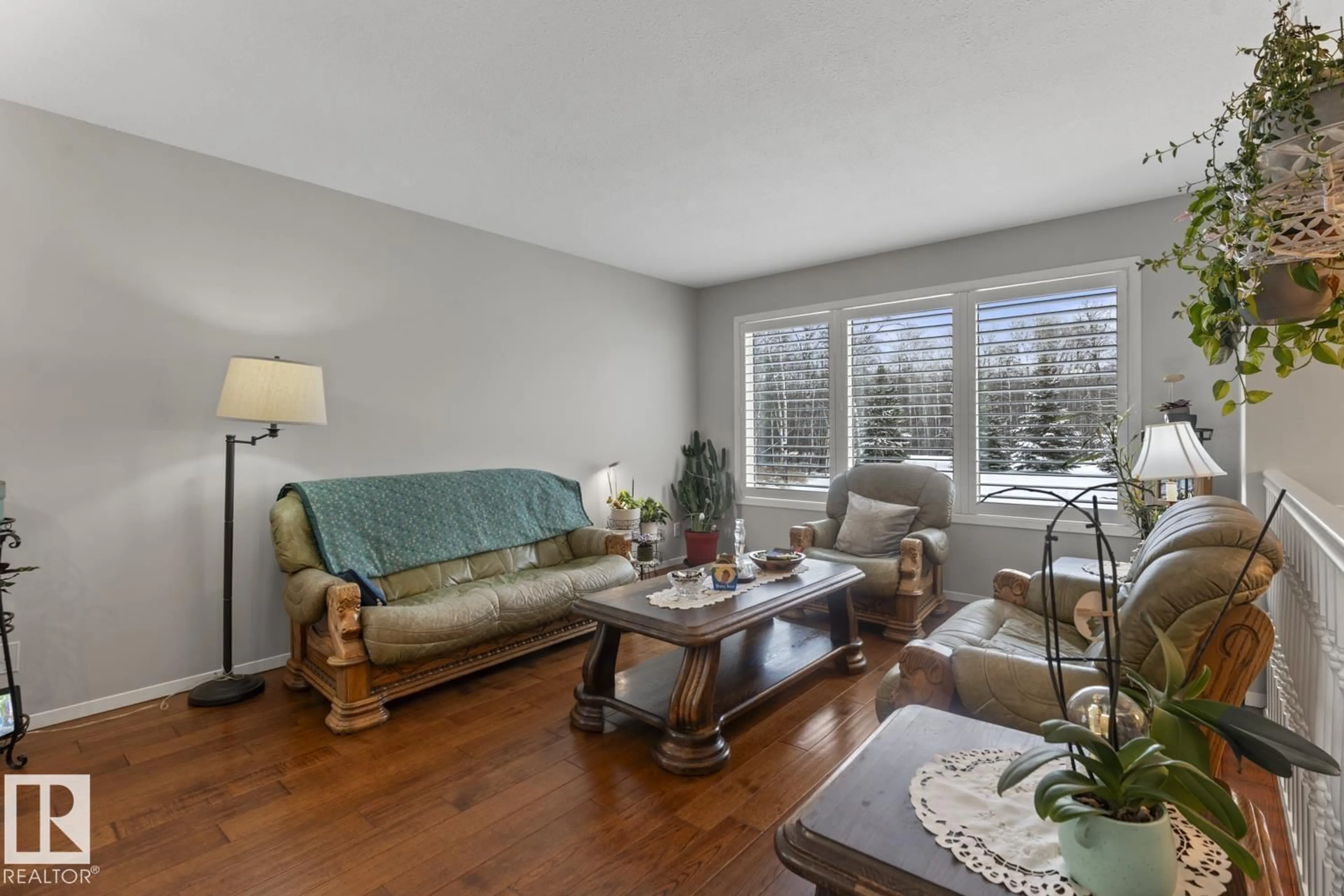 Living room with furniture, wood/laminate floor for 412 RANGE RD, Rural Bonnyville M.D. Alberta T0A0T0