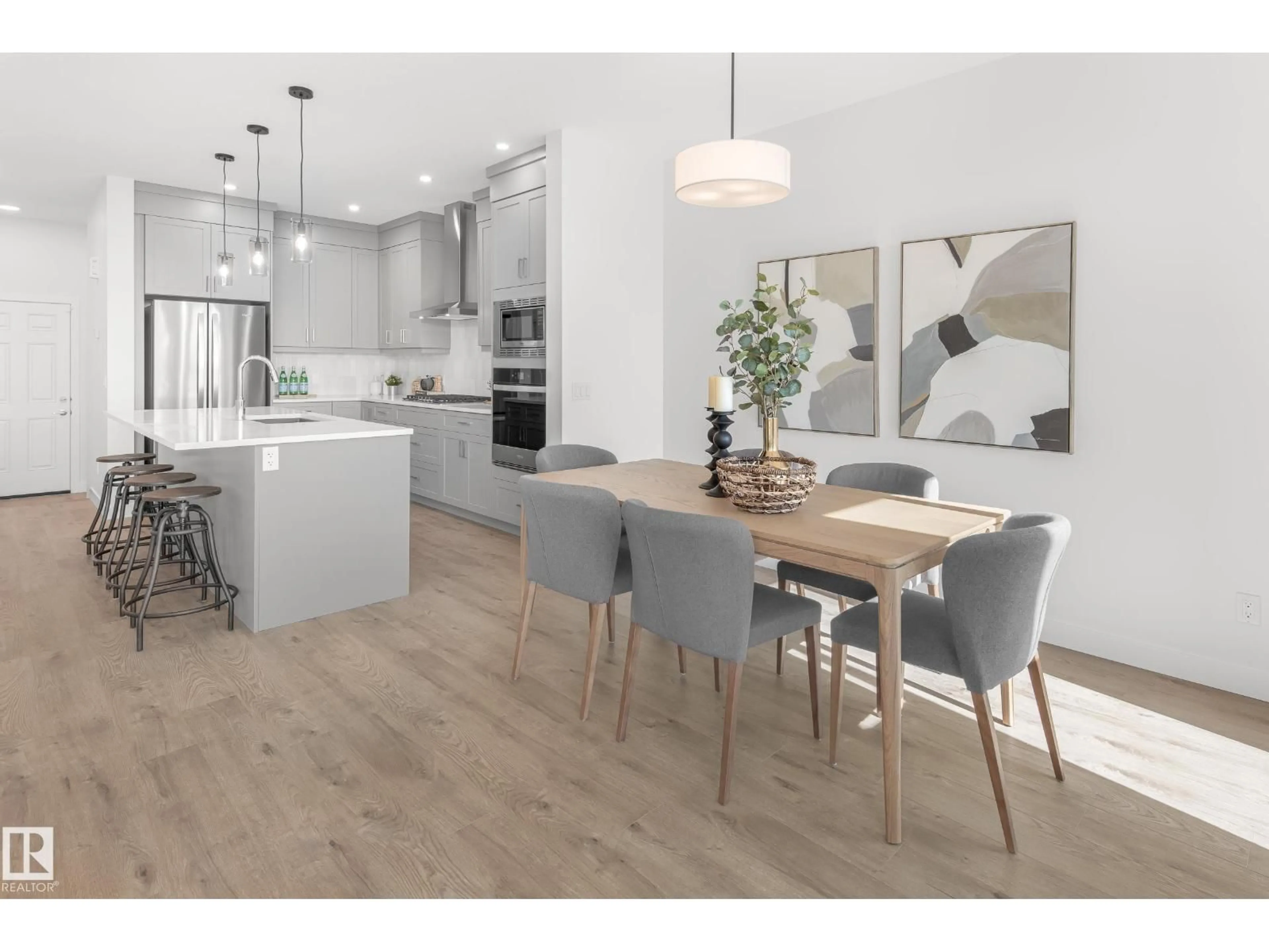 Open concept kitchen, wood/laminate floor for 5669 HAWTHORN WY, Edmonton Alberta T6X3K8