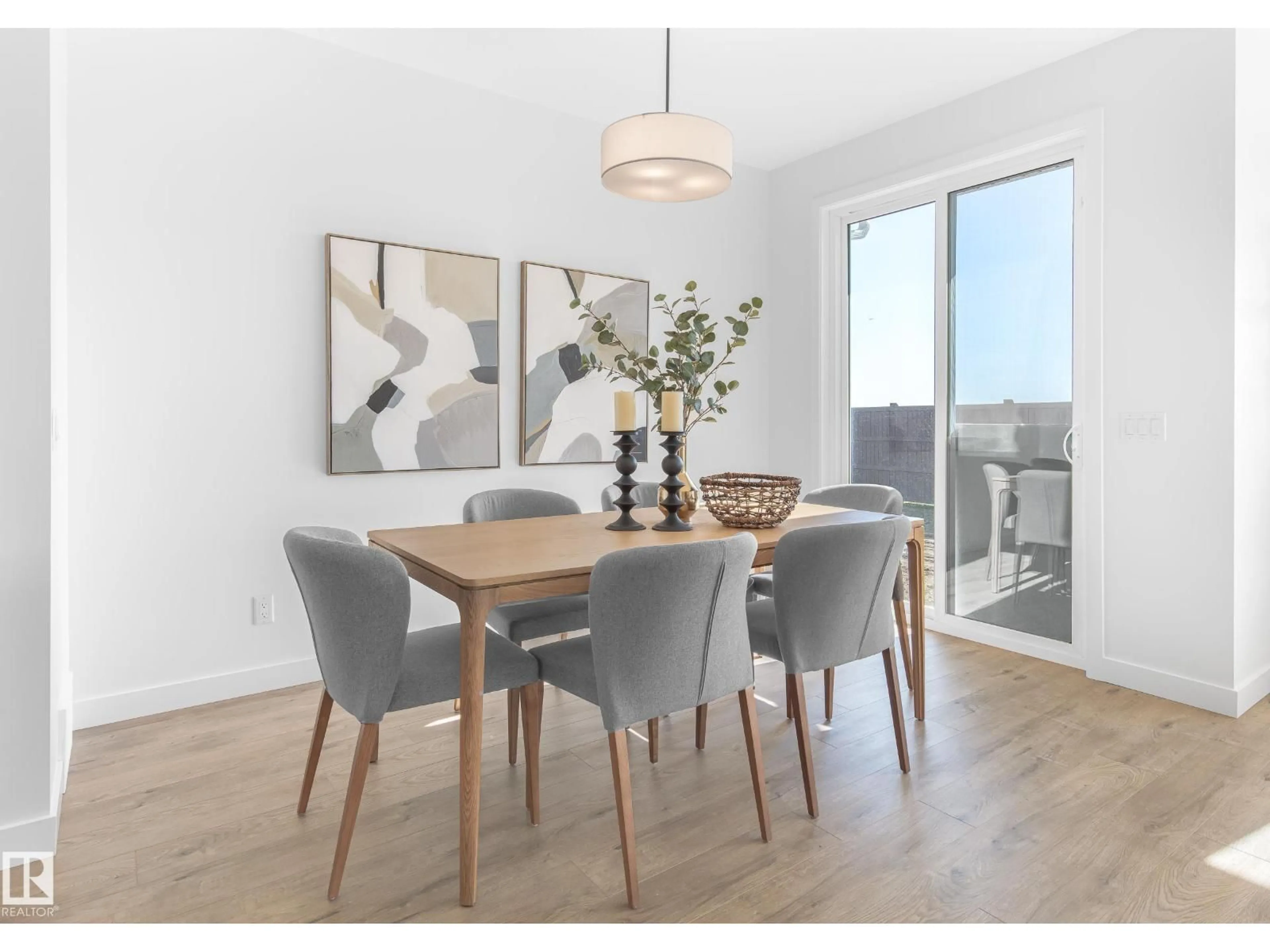 Dining room, wood/laminate floor for 5669 HAWTHORN WY, Edmonton Alberta T6X3K8