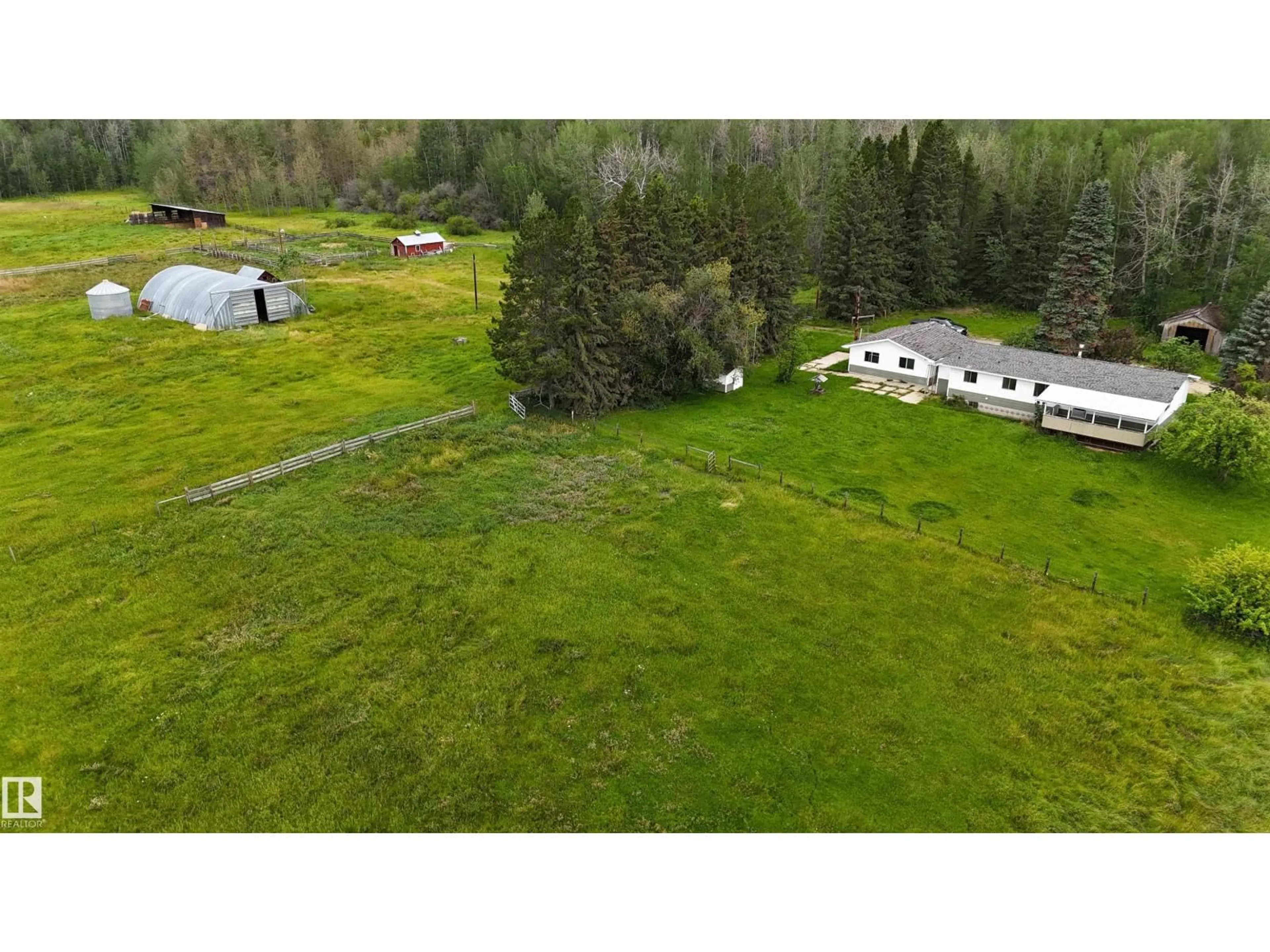 A pic from outside/outdoor area/front of a property/back of a property/a pic from drone, unknown for 49308 RR 75, Drayton Valley Alberta T7A2A3