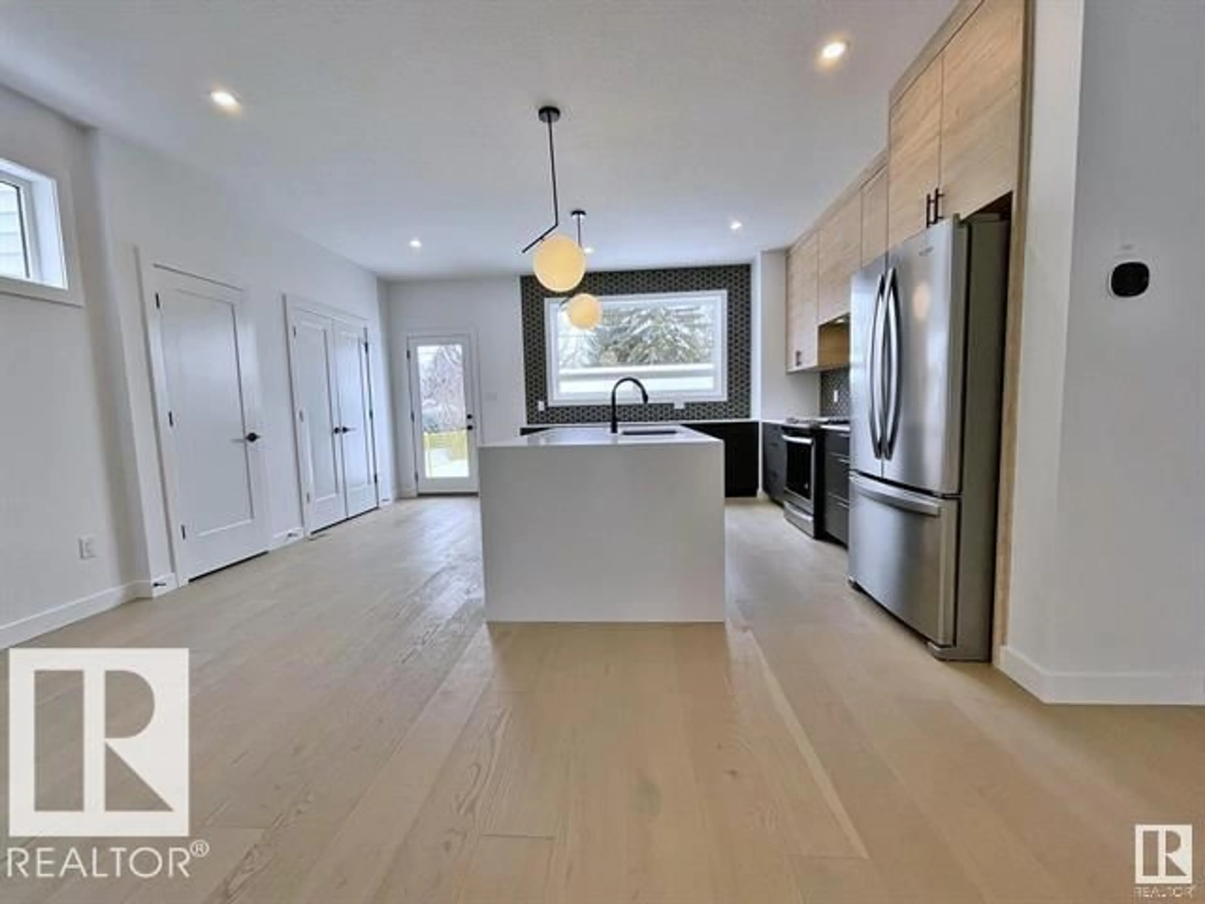 Open concept kitchen, unknown for NW - 11016 132 ST, Edmonton Alberta T5M1E2