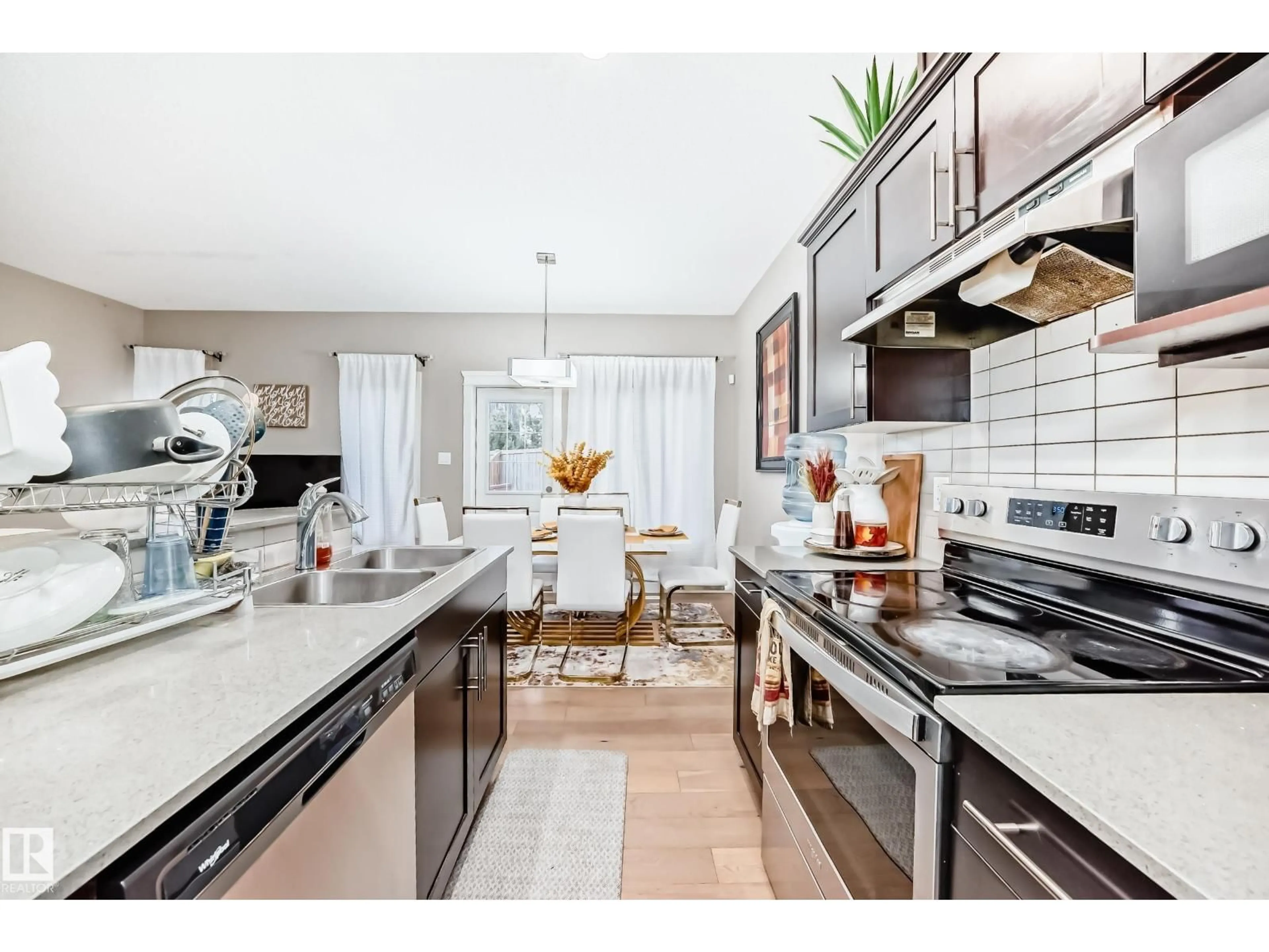 Open concept kitchen, ceramic/tile floor for 246 HAWKS RIDGE BV, Edmonton Alberta T5S0M2