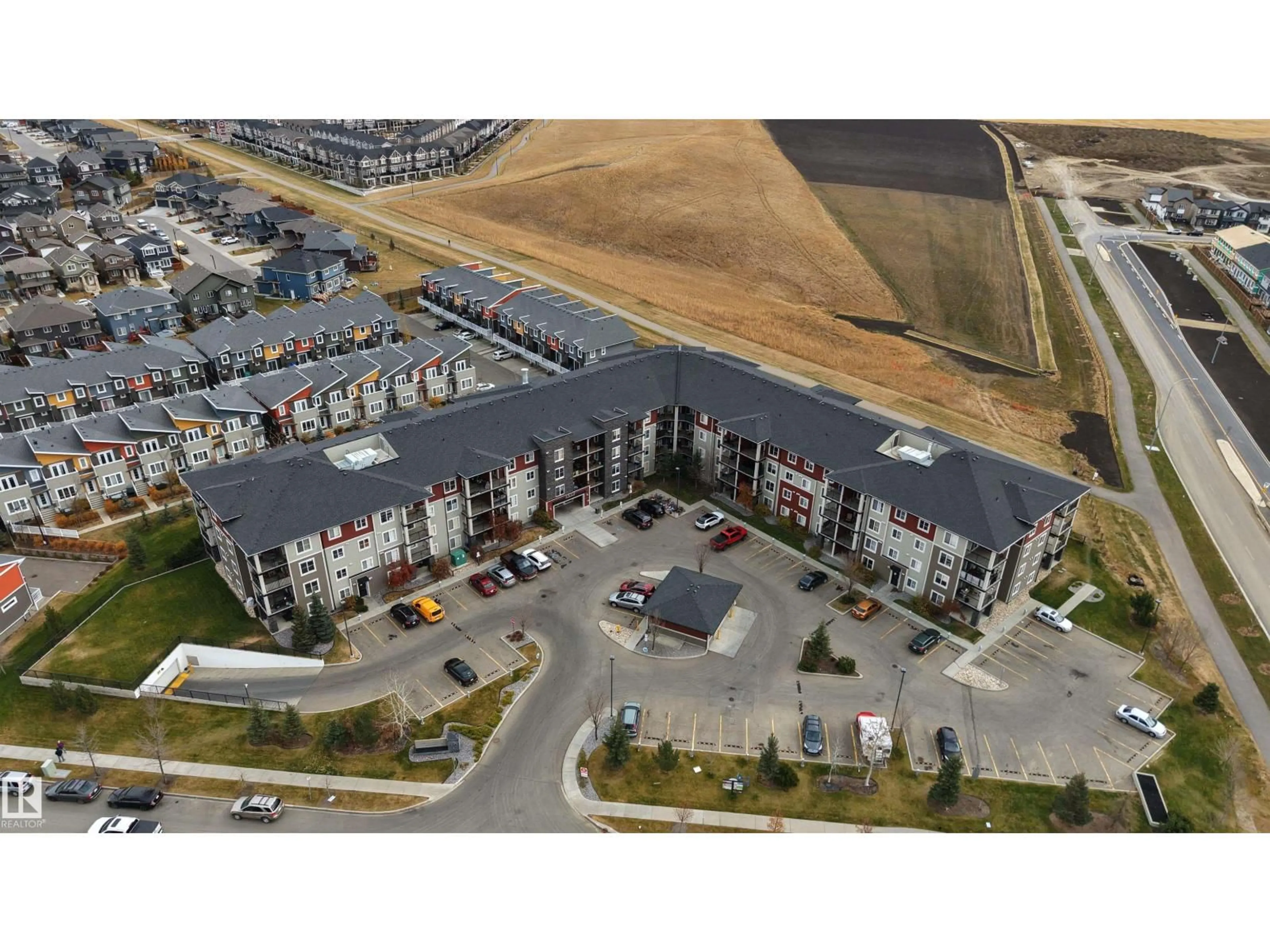 A pic from outside/outdoor area/front of a property/back of a property/a pic from drone, unknown for #203 - 1510 WATT DR, Edmonton Alberta T6X2E6