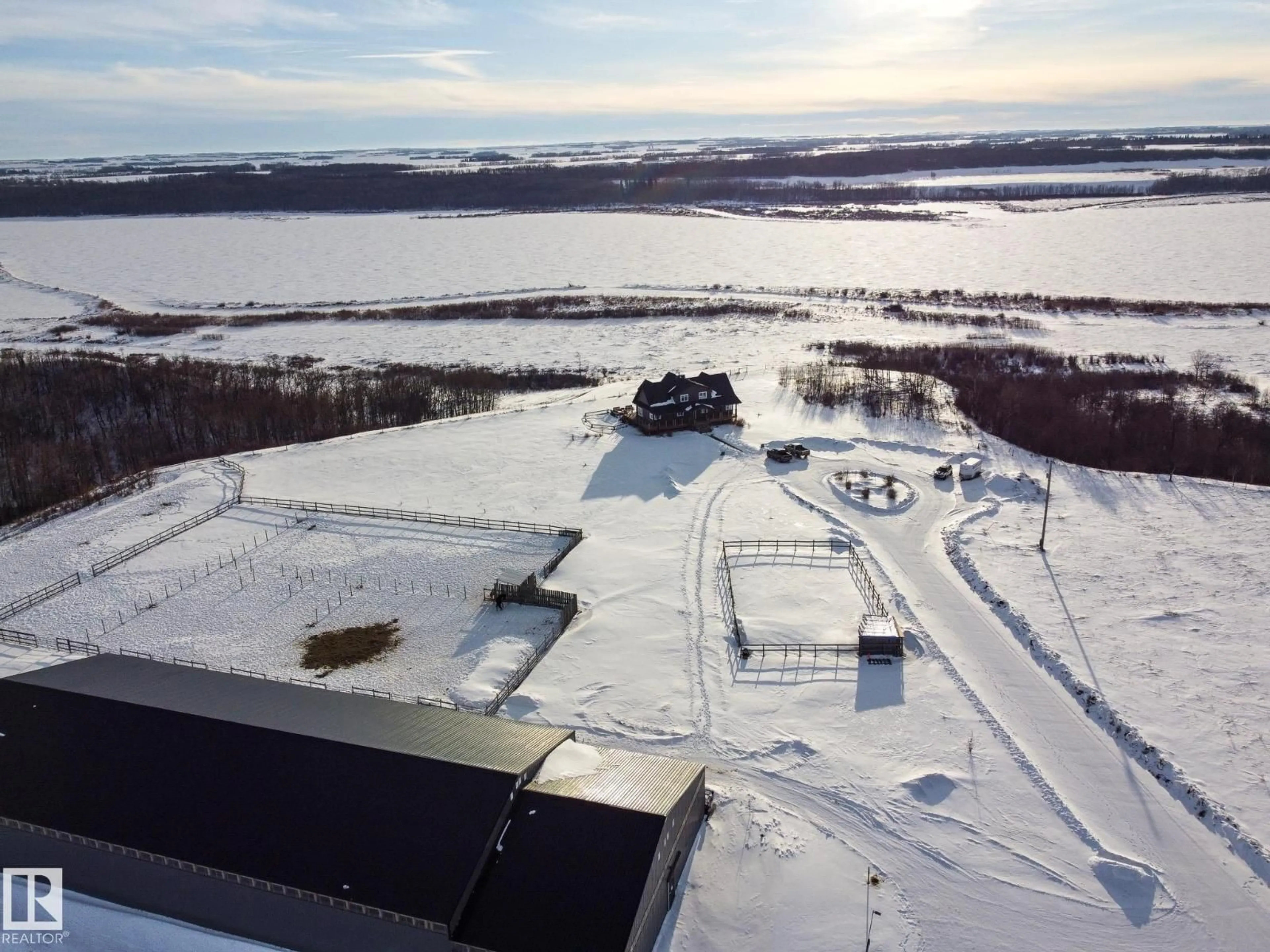 A pic from outside/outdoor area/front of a property/back of a property/a pic from drone, water/lake/river/ocean view for 20213 TOWNSHIP ROAD 460, Rural Camrose County Alberta T4V2M9