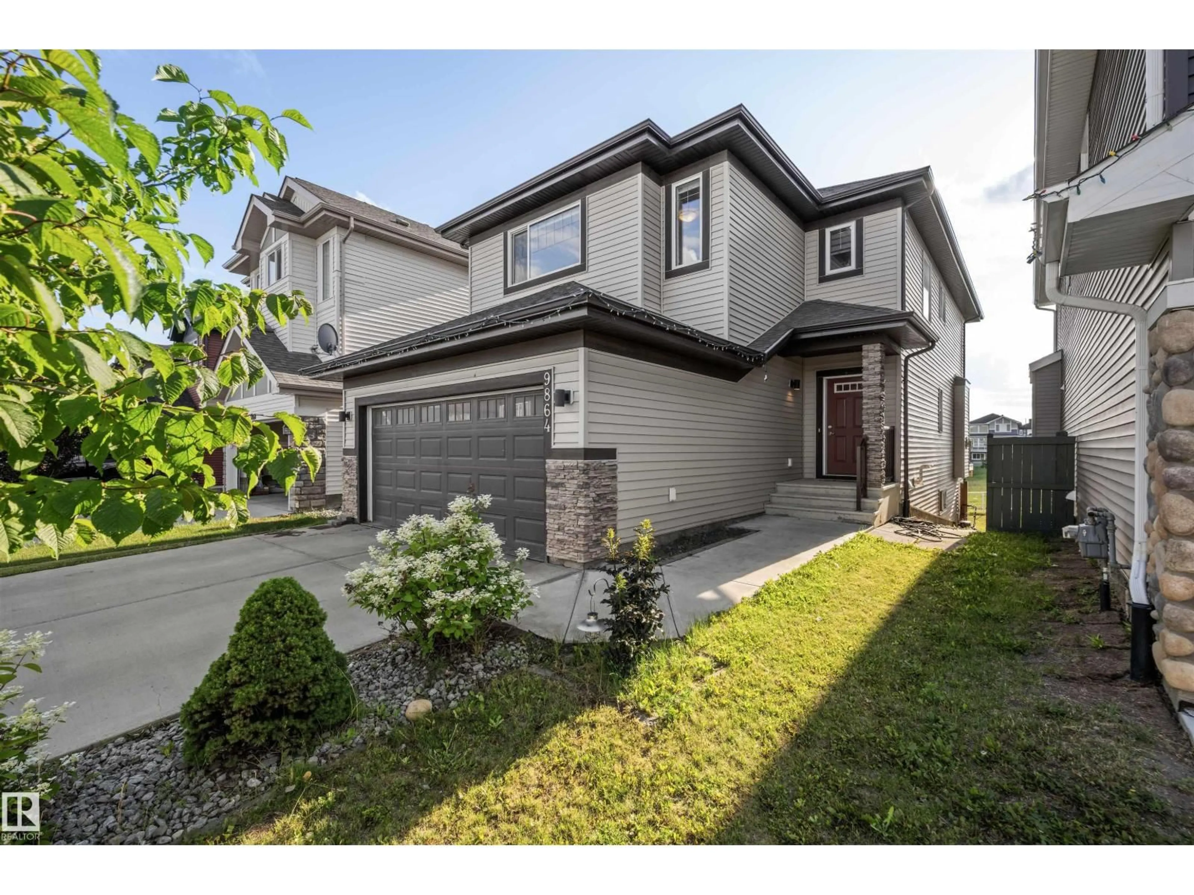 Home with brick exterior material, street for NW - 9864 222 ST, Edmonton Alberta T5T7J1