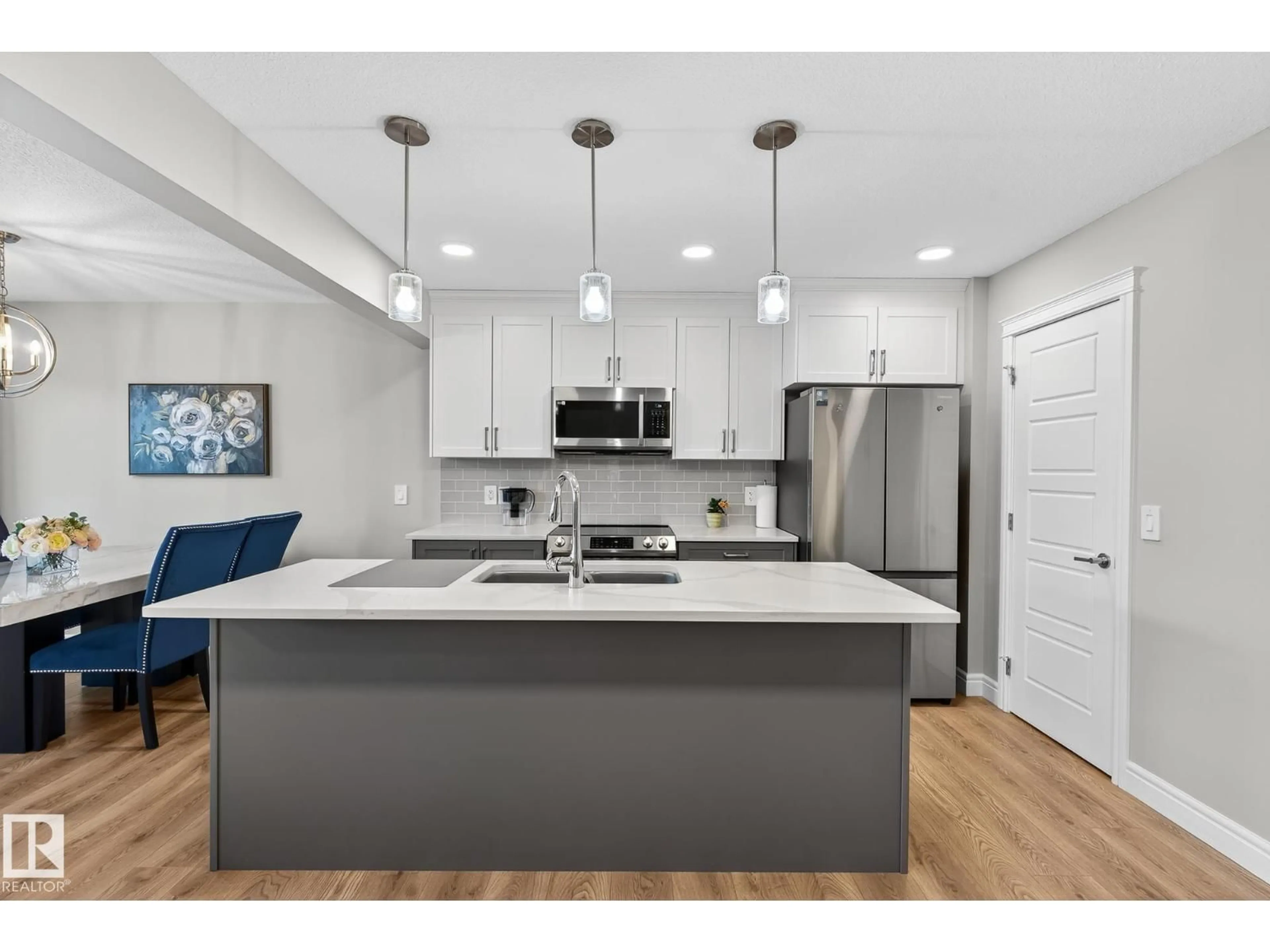 Open concept kitchen, unknown for LI SW - 7820 KORULUK LINK, Edmonton Alberta T6W4V1