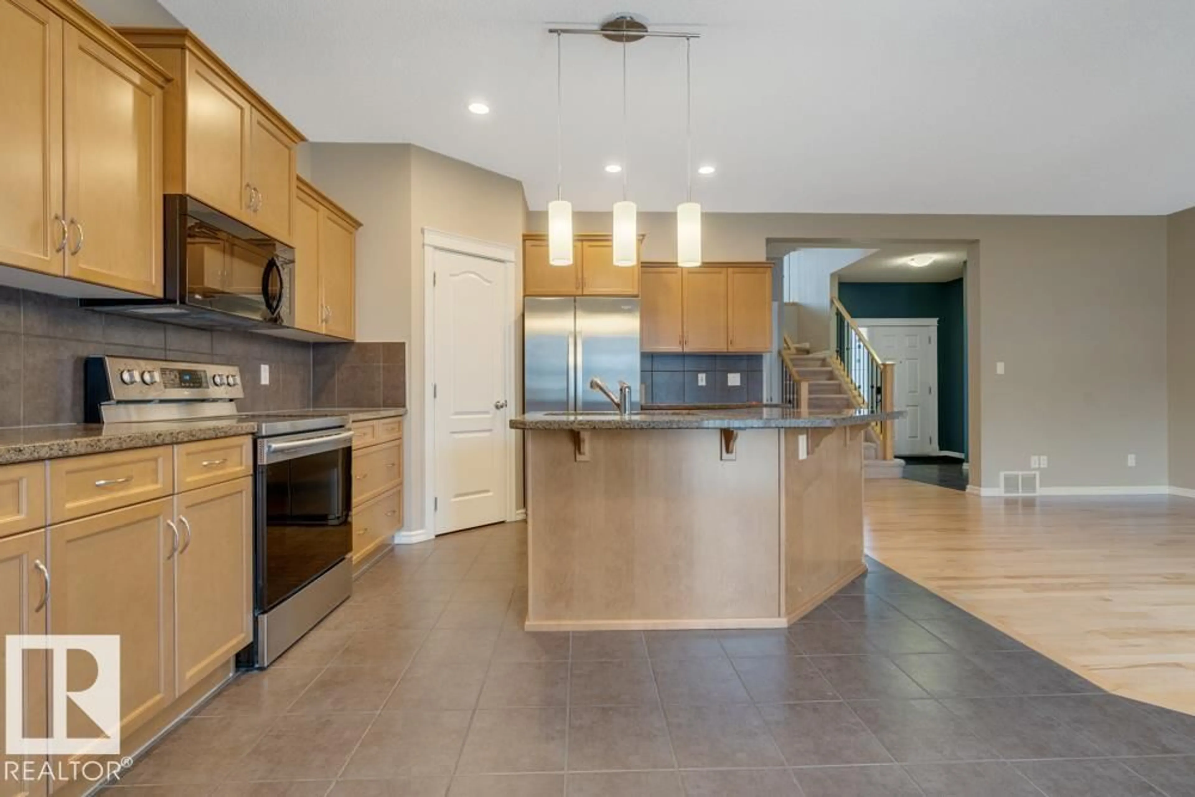 Open concept kitchen, ceramic/tile floor for 8111 16A AV, Edmonton Alberta T6X0H8