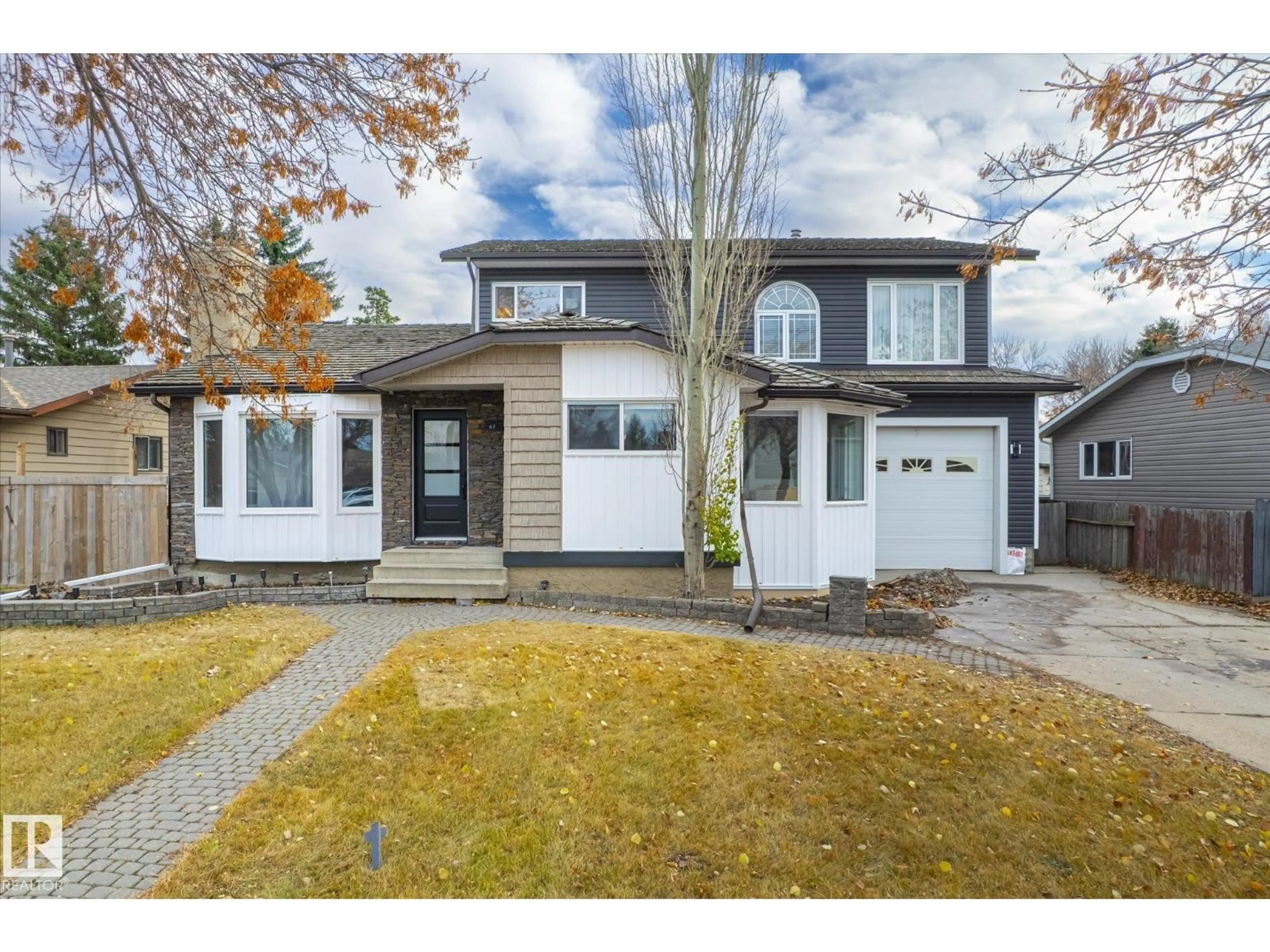 Home with vinyl exterior material, street for 67 ARLINGTON DR, St. Albert Alberta T8N2Z2