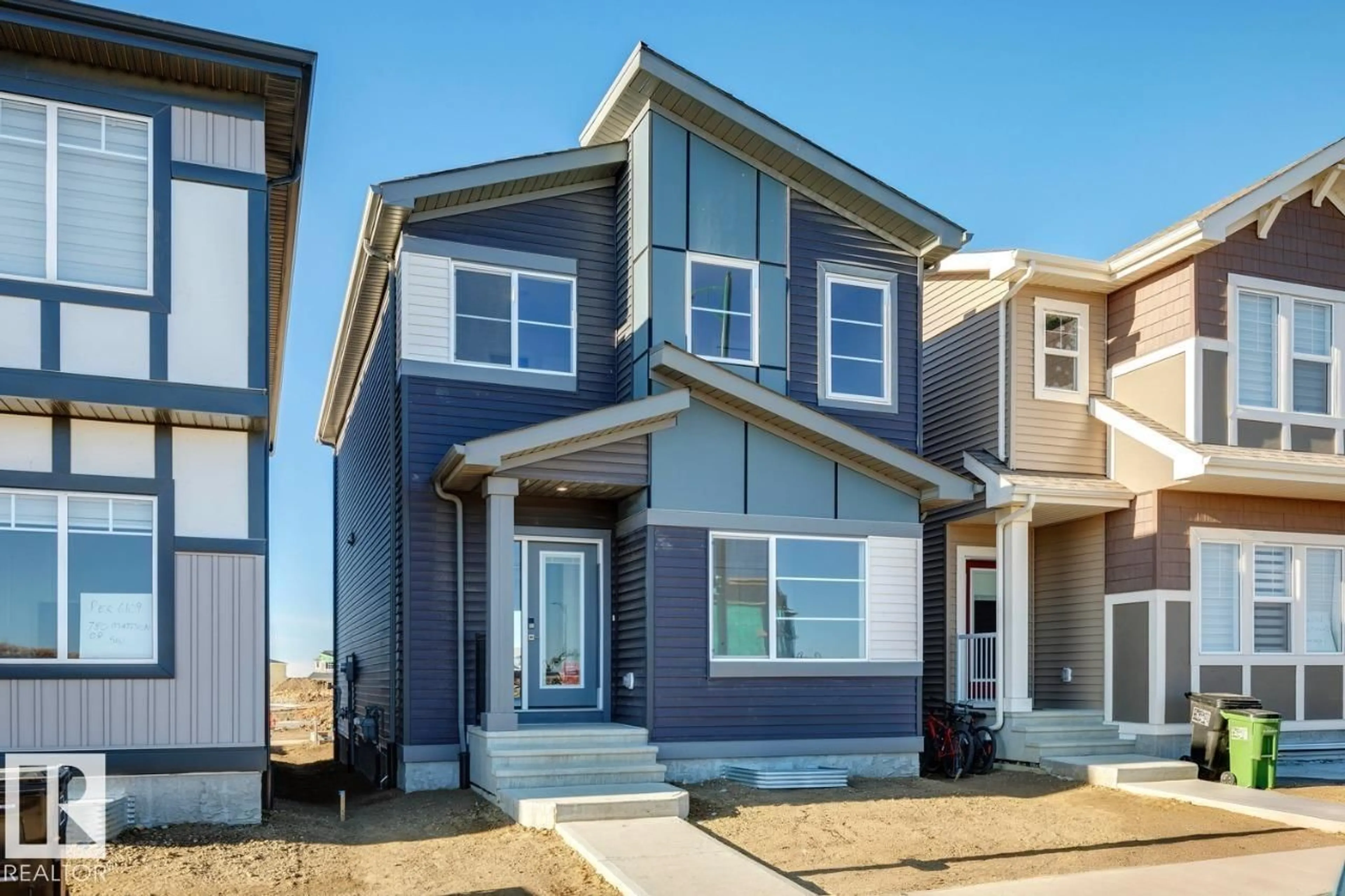 Home with vinyl exterior material, street for 778 MATTSON DR, Edmonton Alberta T6X3J2