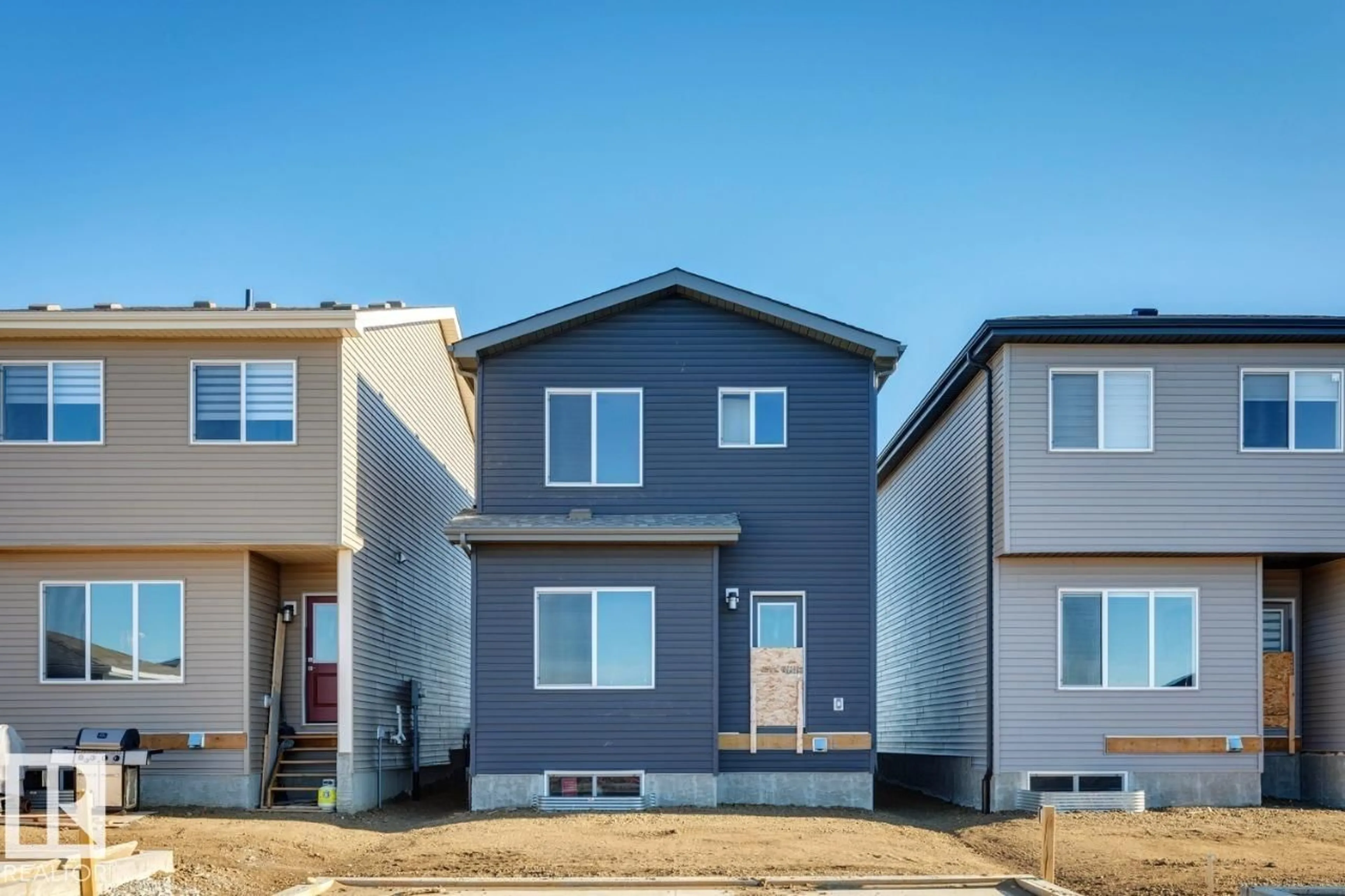 Home with vinyl exterior material, street for 778 MATTSON DR, Edmonton Alberta T6X3J2