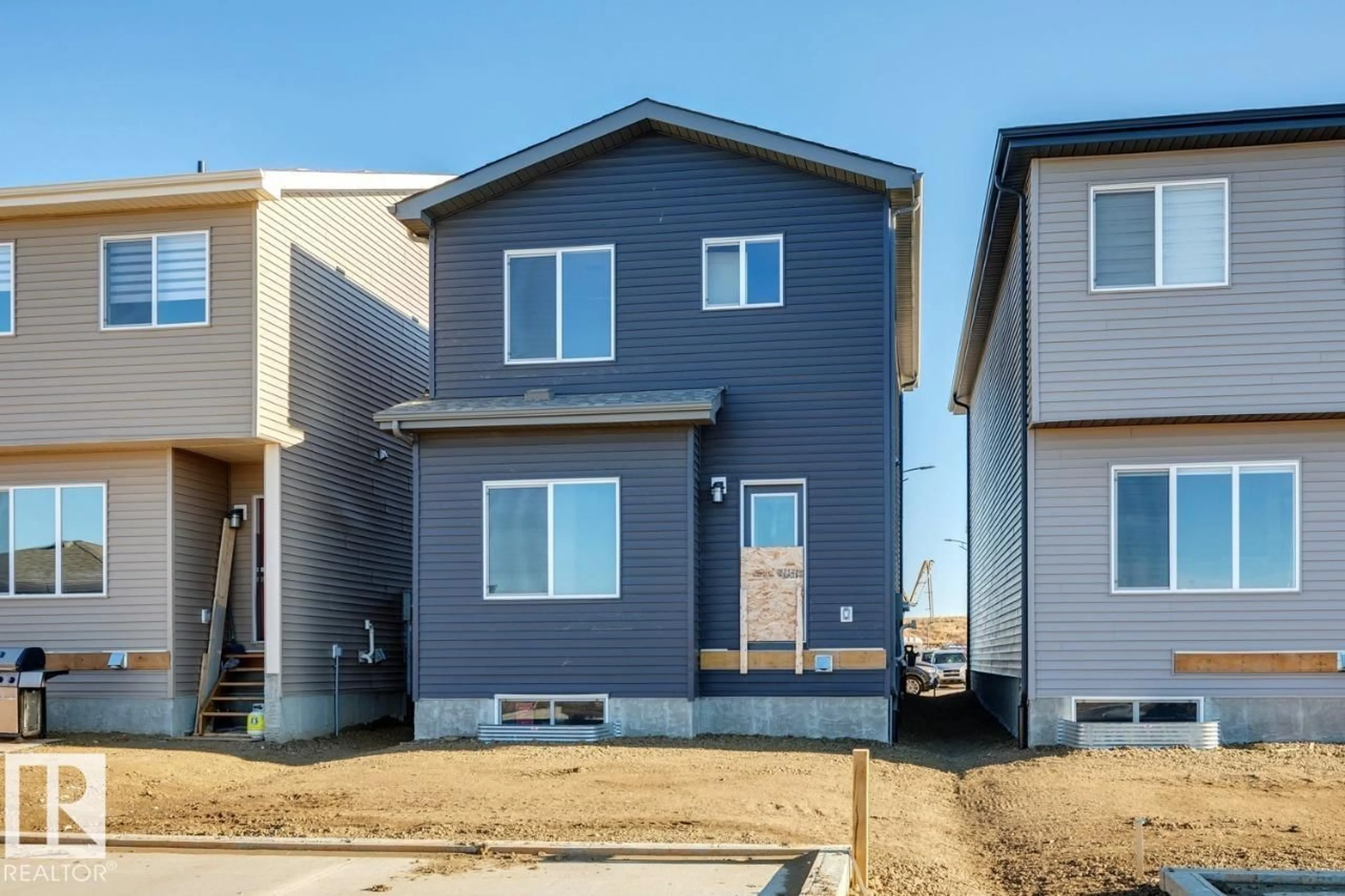 Home with vinyl exterior material, street for 778 MATTSON DR, Edmonton Alberta T6X3J2