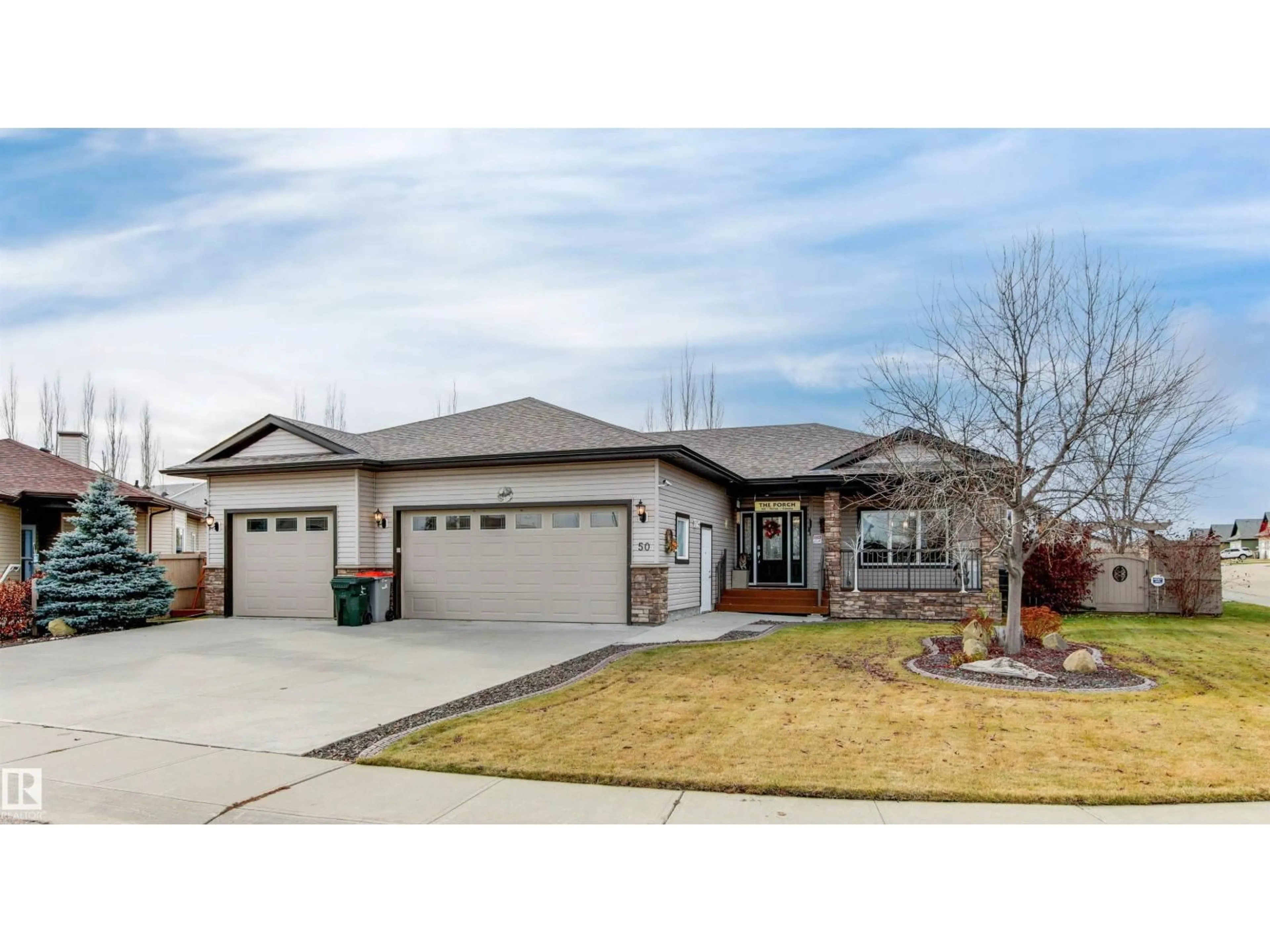 Home with vinyl exterior material, street for 50 WILLOW WOOD LN, Stony Plain Alberta T7Z0E3