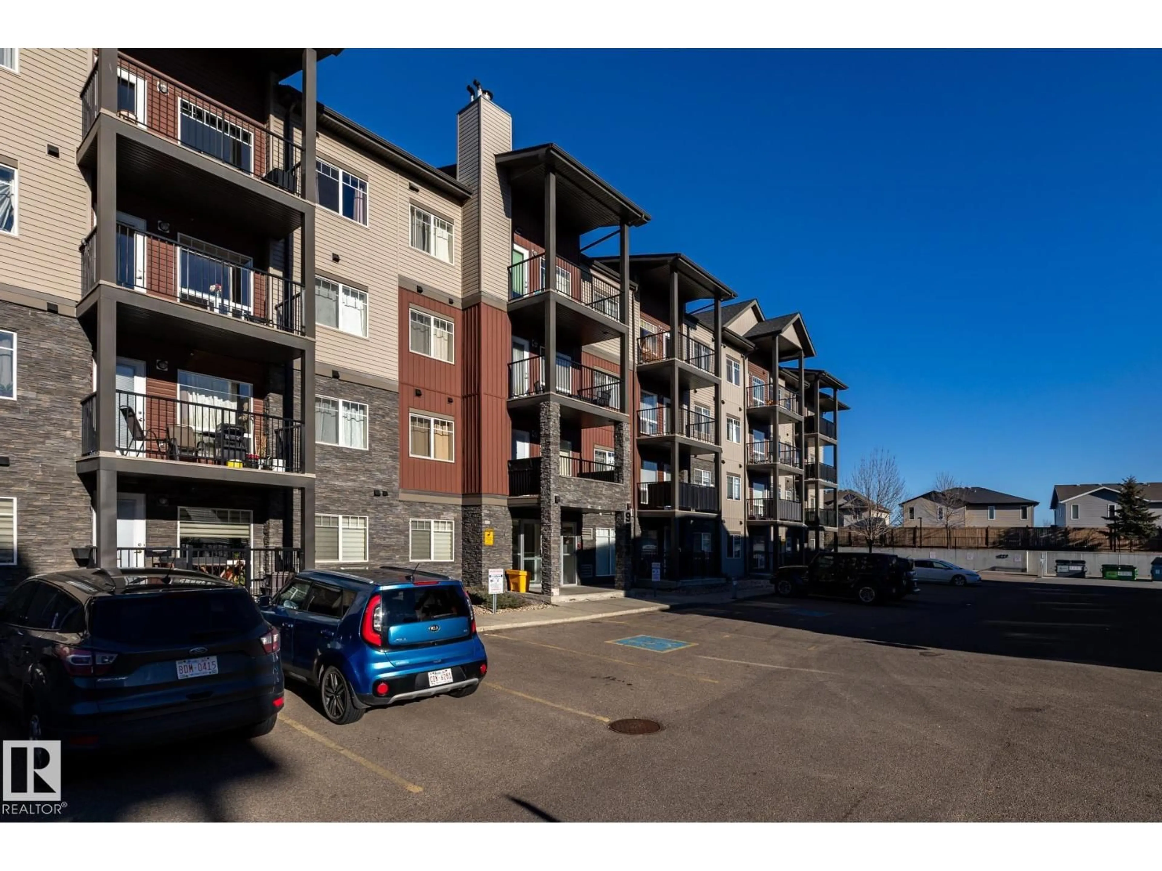 A pic from outside/outdoor area/front of a property/back of a property/a pic from drone, unknown for 108 - 9523 160 AV, Edmonton Alberta T5Z0N1