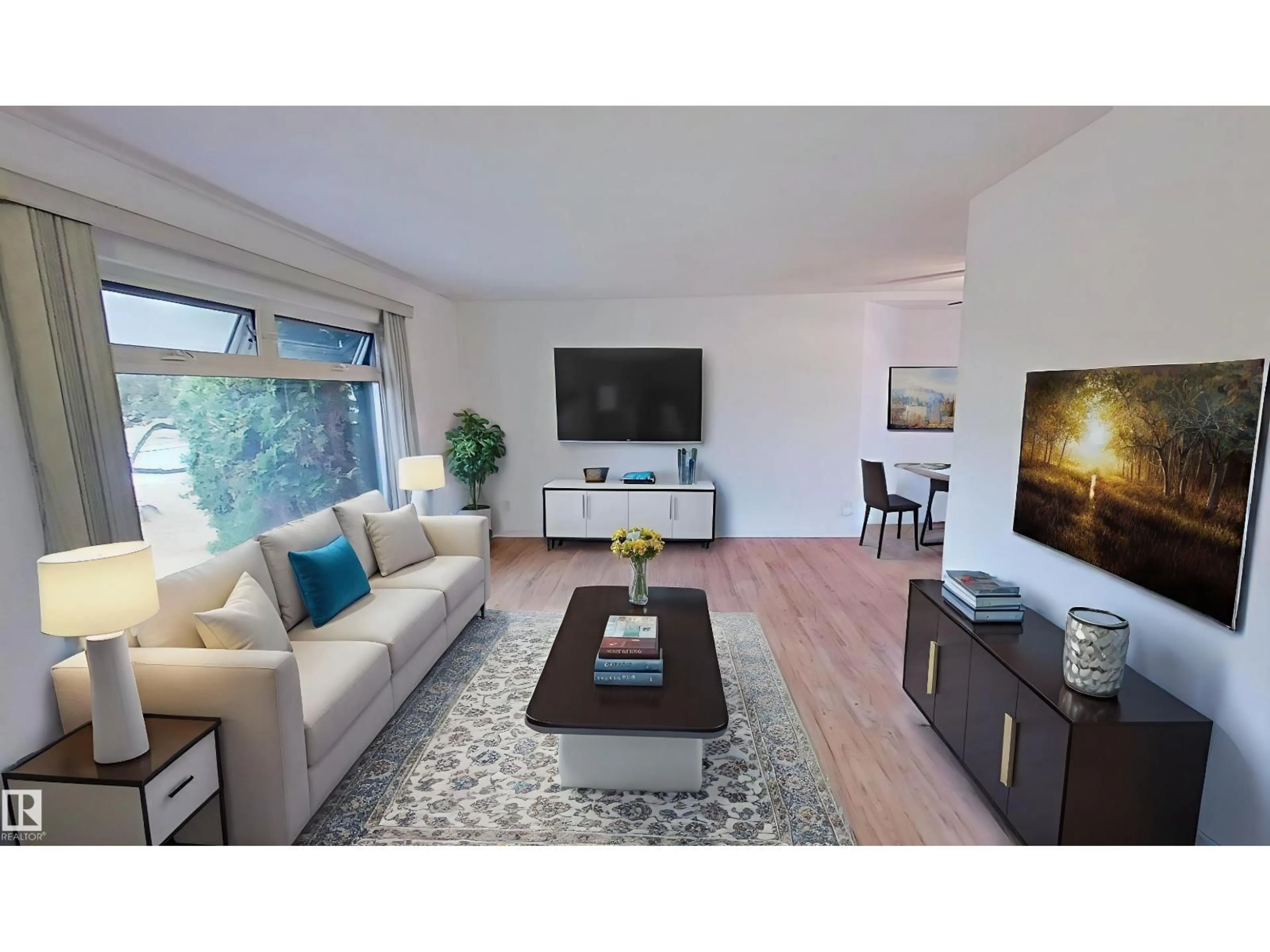 Living room with furniture, wood/laminate floor for 7004 93 AV, Edmonton Alberta T6B0W6