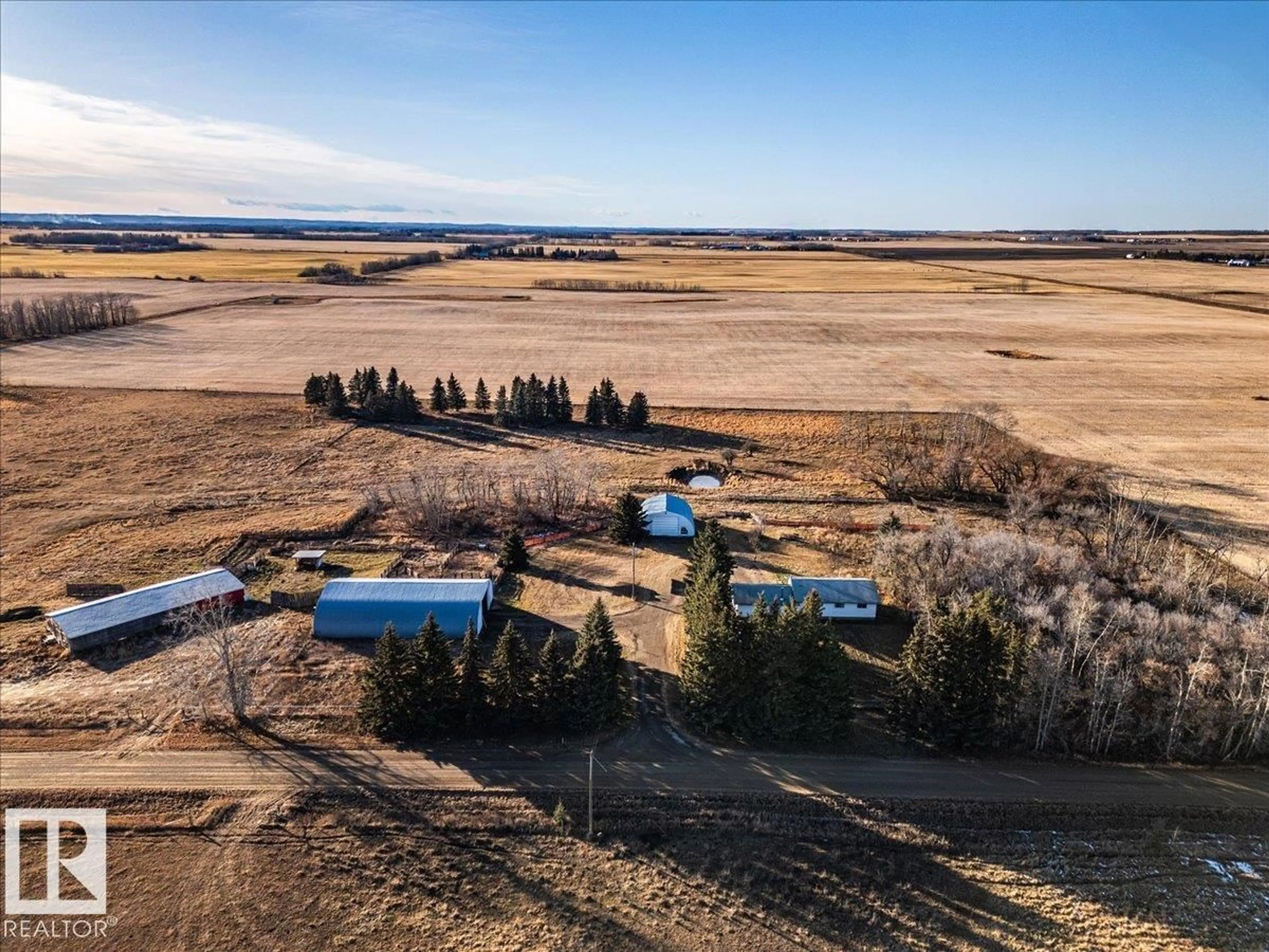 A pic from outside/outdoor area/front of a property/back of a property/a pic from drone, unknown for 453058 RGE ROAD 270, Rural Wetaskiwin County Alberta T0C1H0