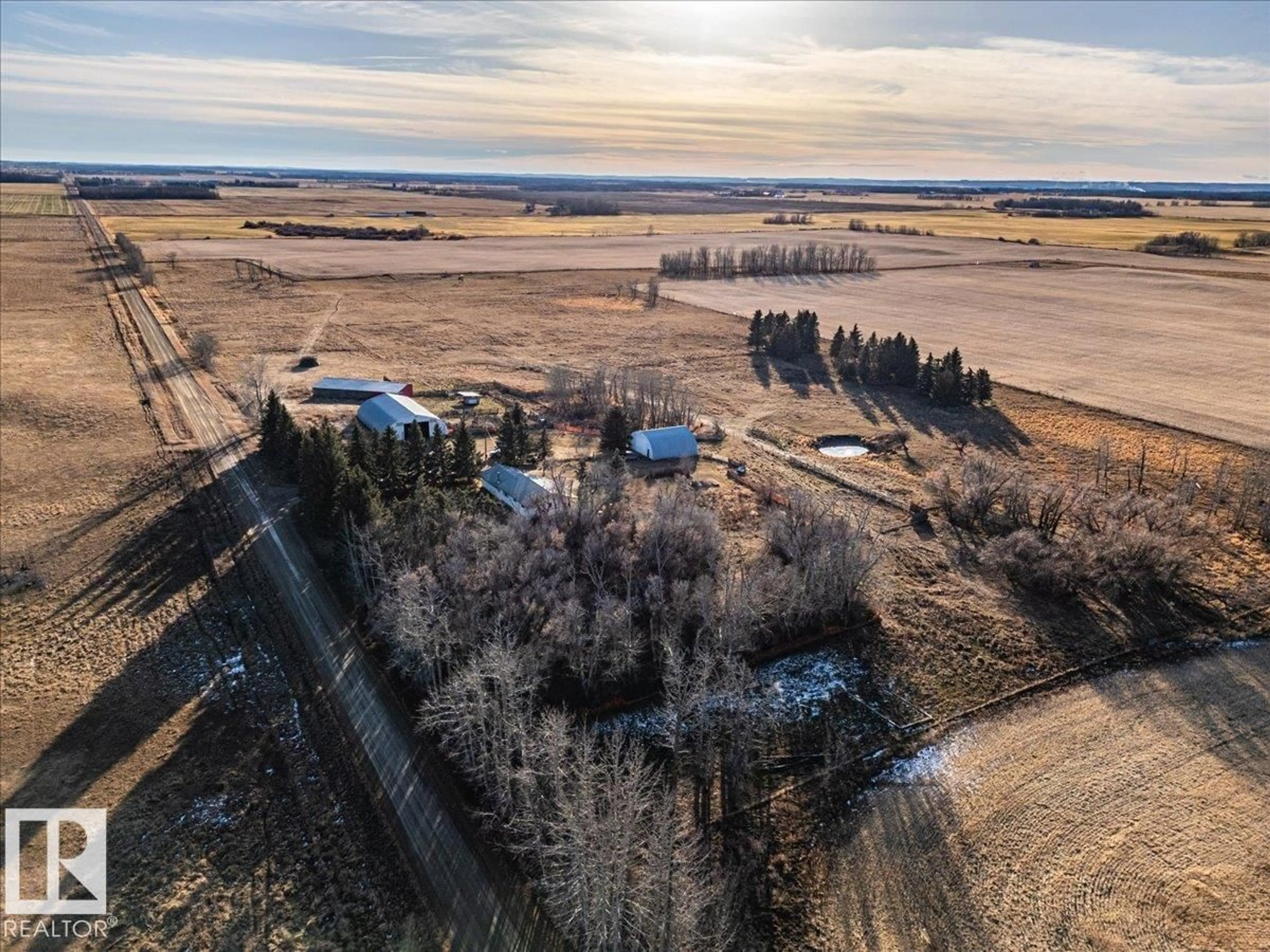 A pic from outside/outdoor area/front of a property/back of a property/a pic from drone, water/lake/river/ocean view for 453058 RGE ROAD 270, Rural Wetaskiwin County Alberta T0C1H0