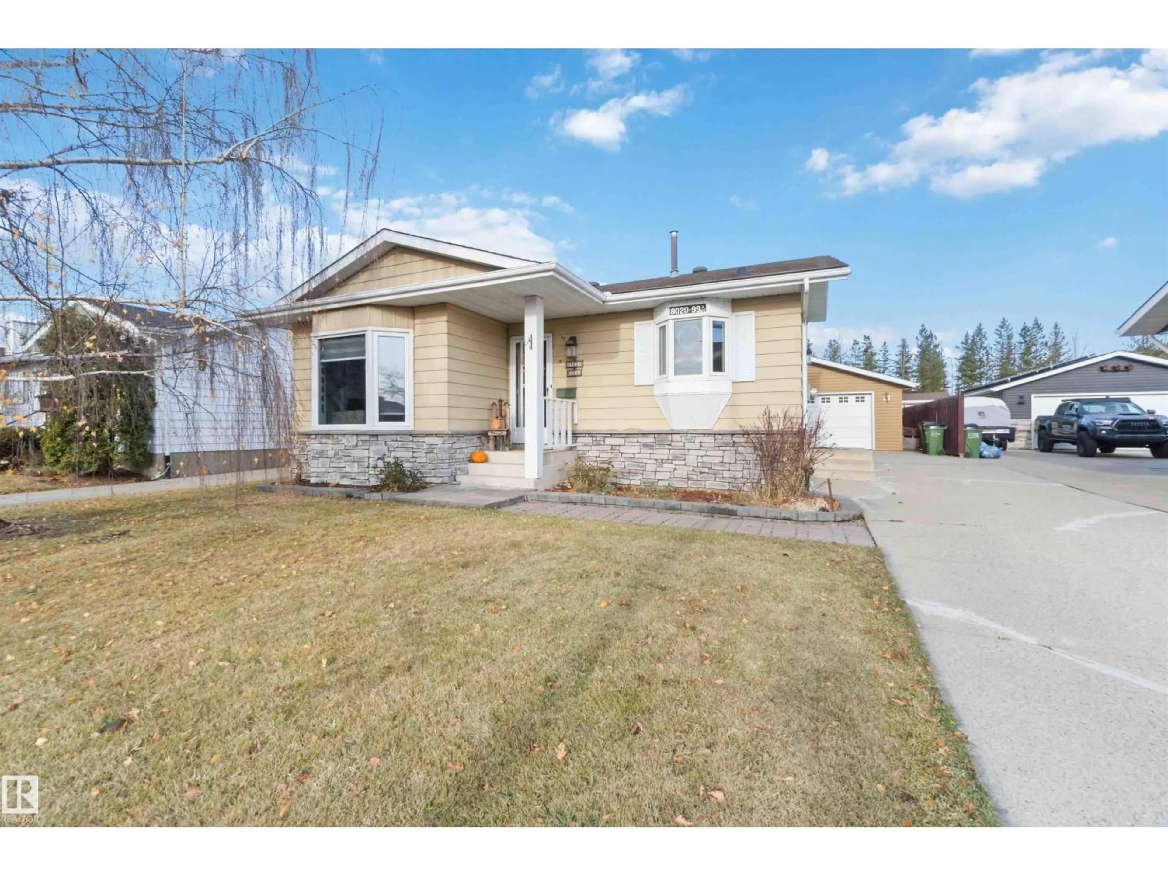 Home with vinyl exterior material, street for 18020 99A AV, Edmonton Alberta T5T3R1