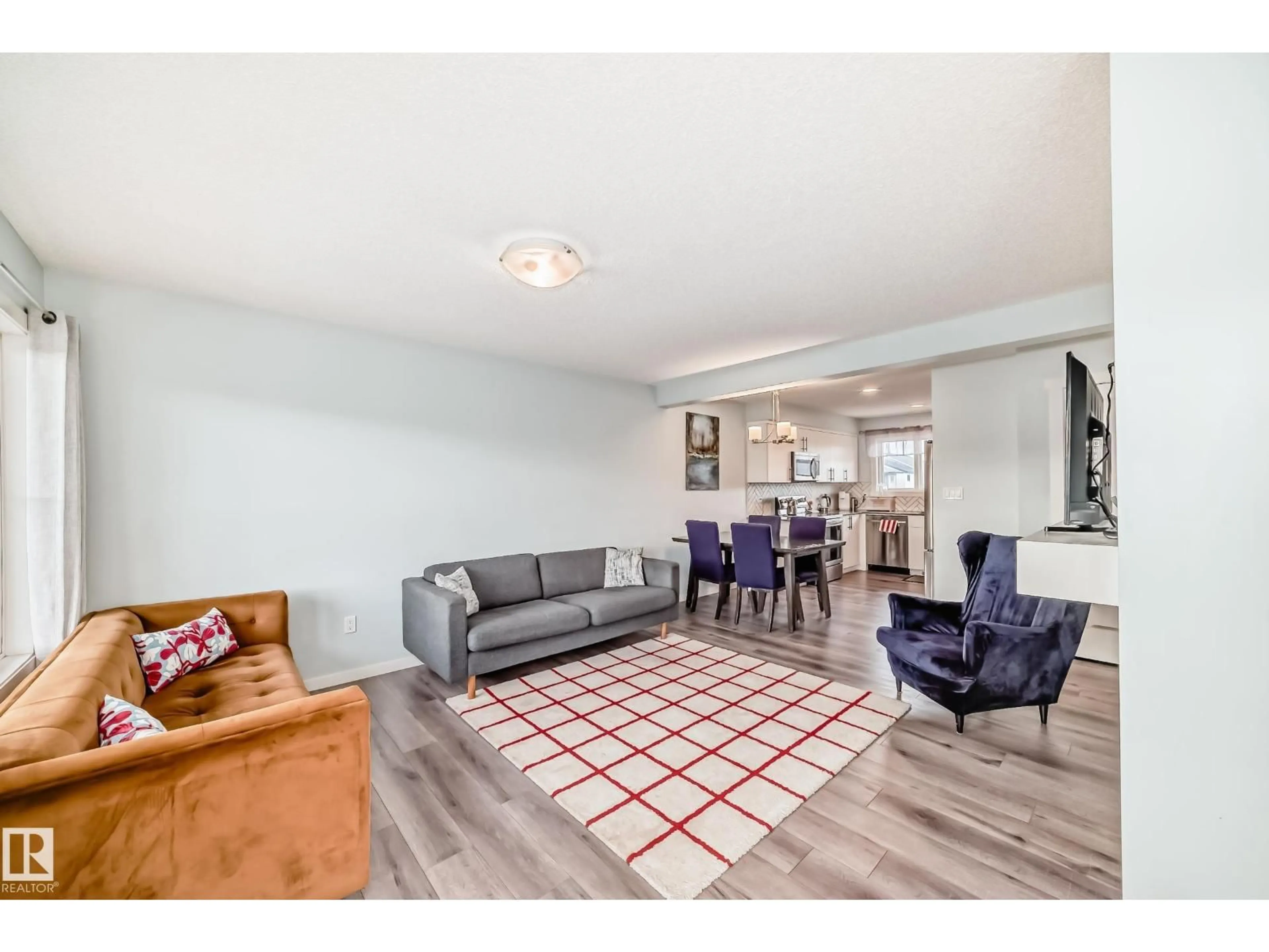 Living room with furniture, unknown for 19312 27 AV, Edmonton Alberta T6M1K9