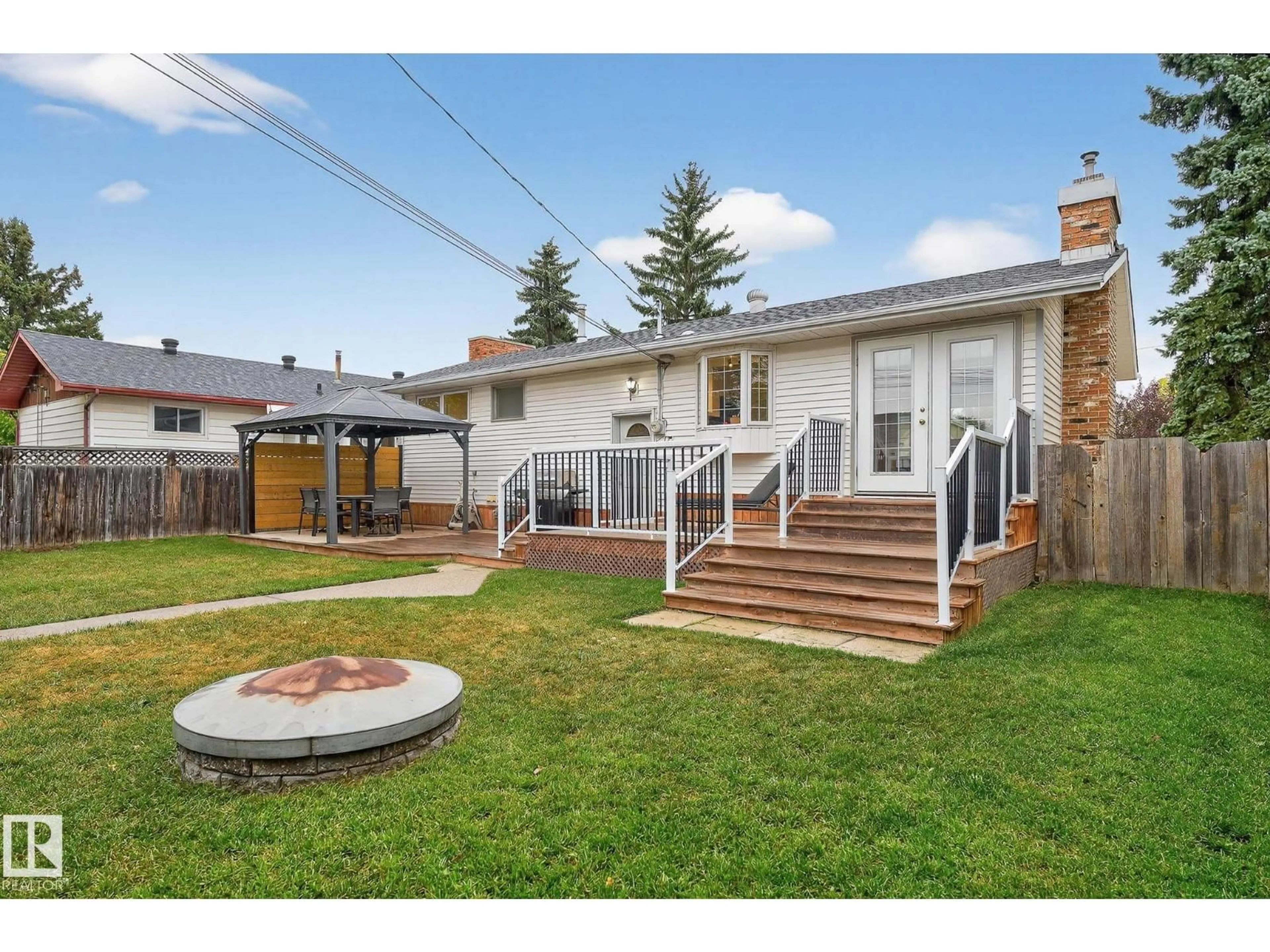 Home with vinyl exterior material, street for NW - 11006 154 ST, Edmonton Alberta T5P2K1