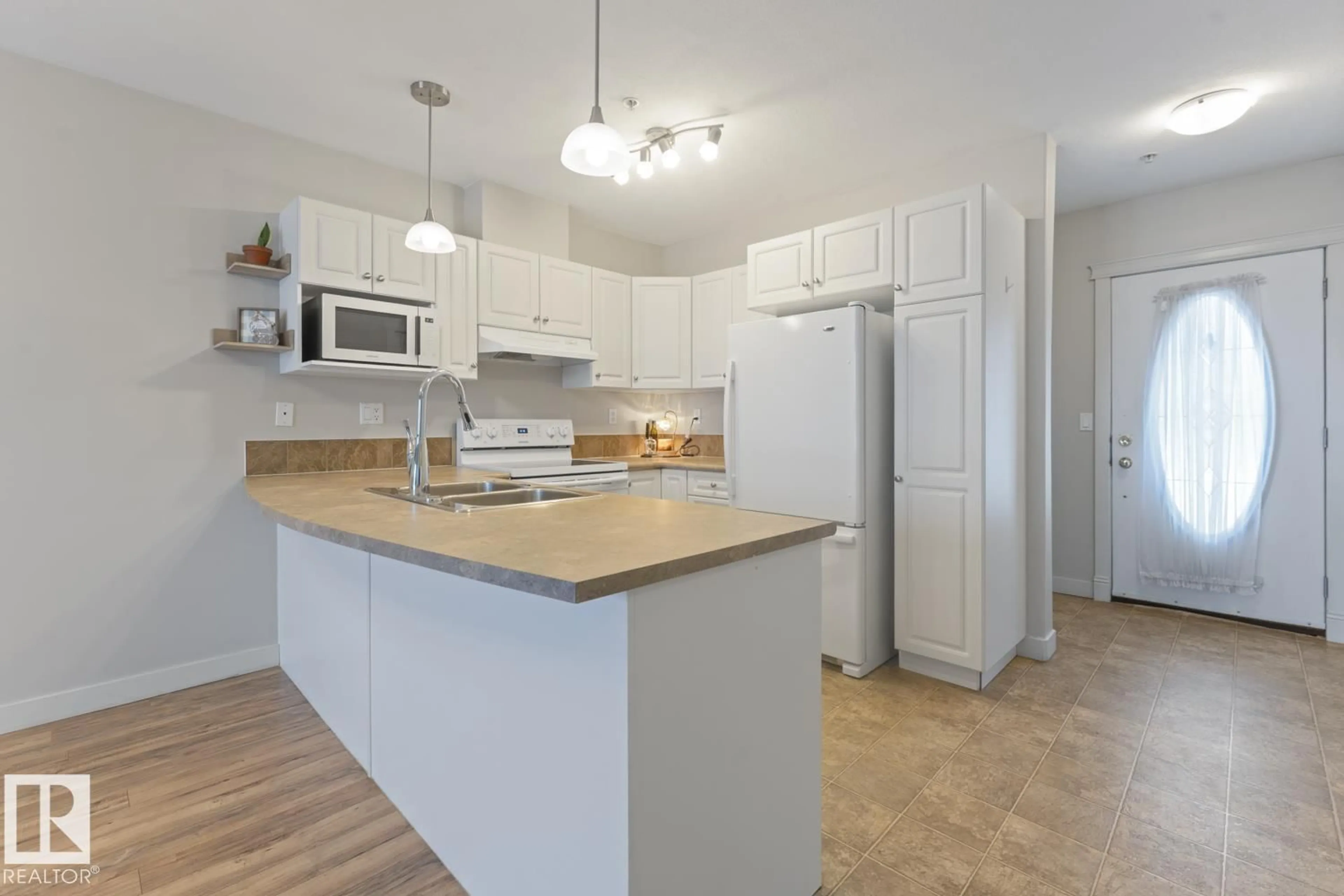 Open concept kitchen, unknown for 204 - 802 12 ST, Cold Lake Alberta T9M0A7
