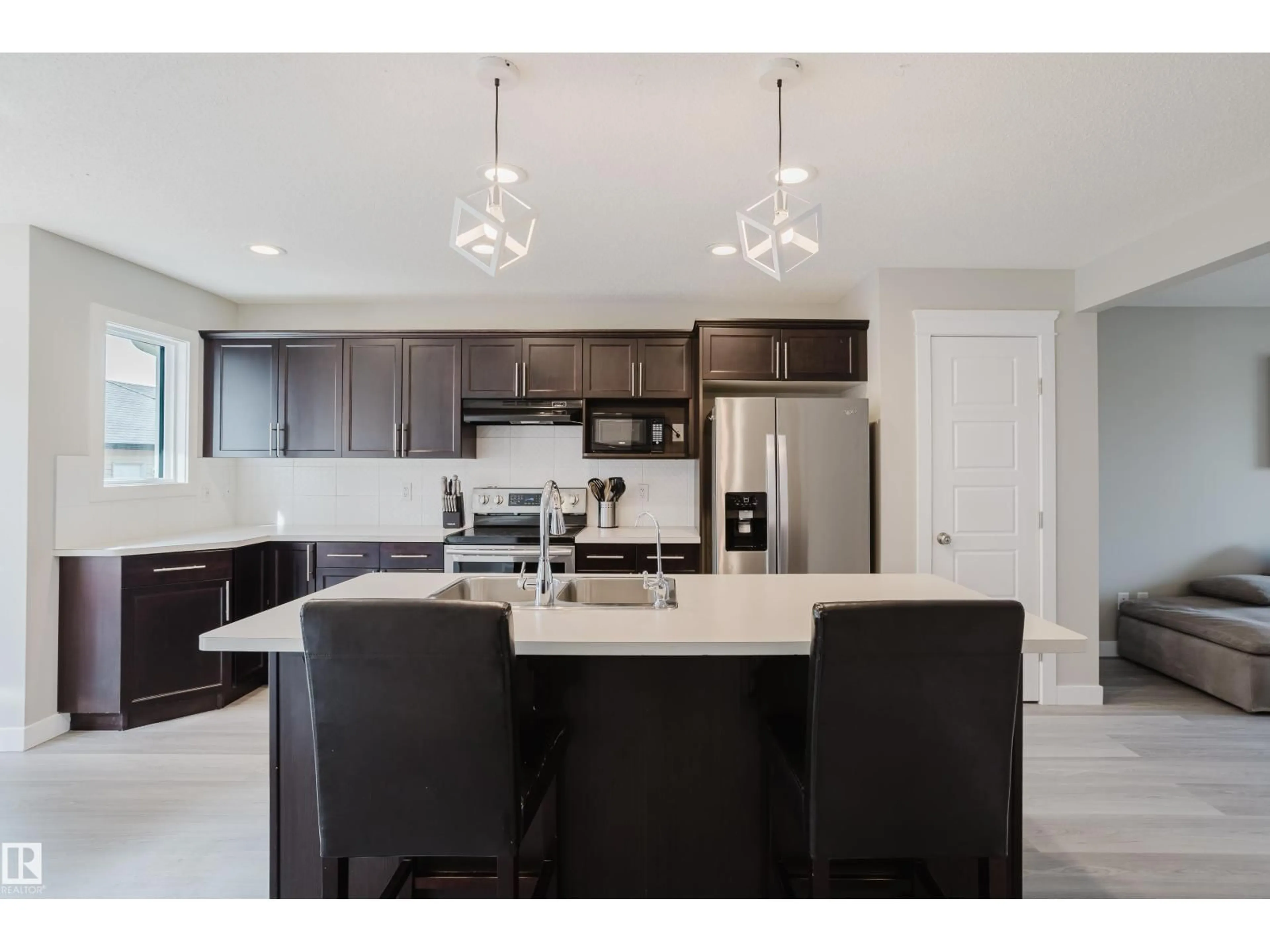 Open concept kitchen, ceramic/tile floor for 287 DESROCHERS BV, Edmonton Alberta T6W3H9