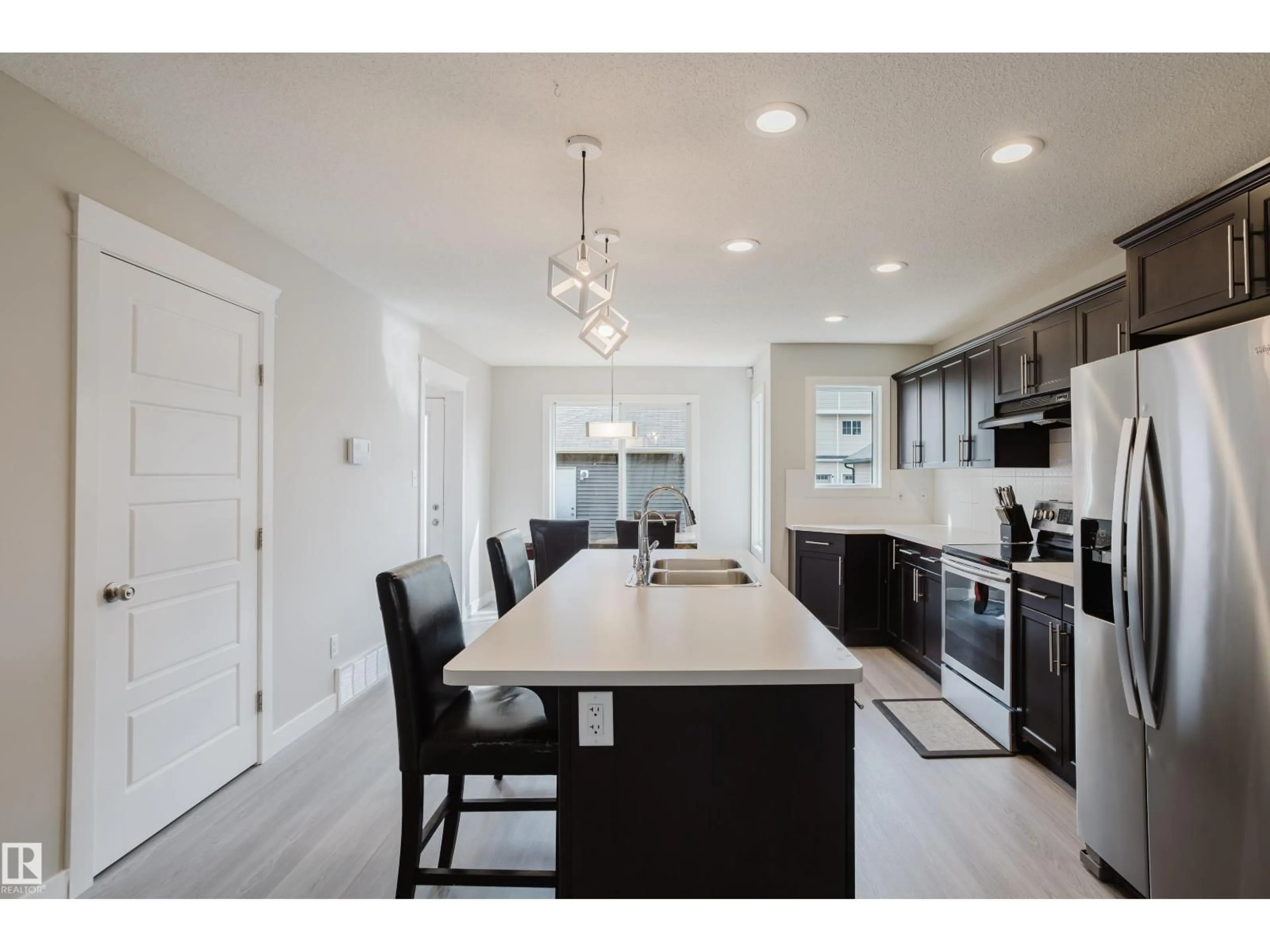 Open concept kitchen, ceramic/tile floor for 287 DESROCHERS BV, Edmonton Alberta T6W3H9