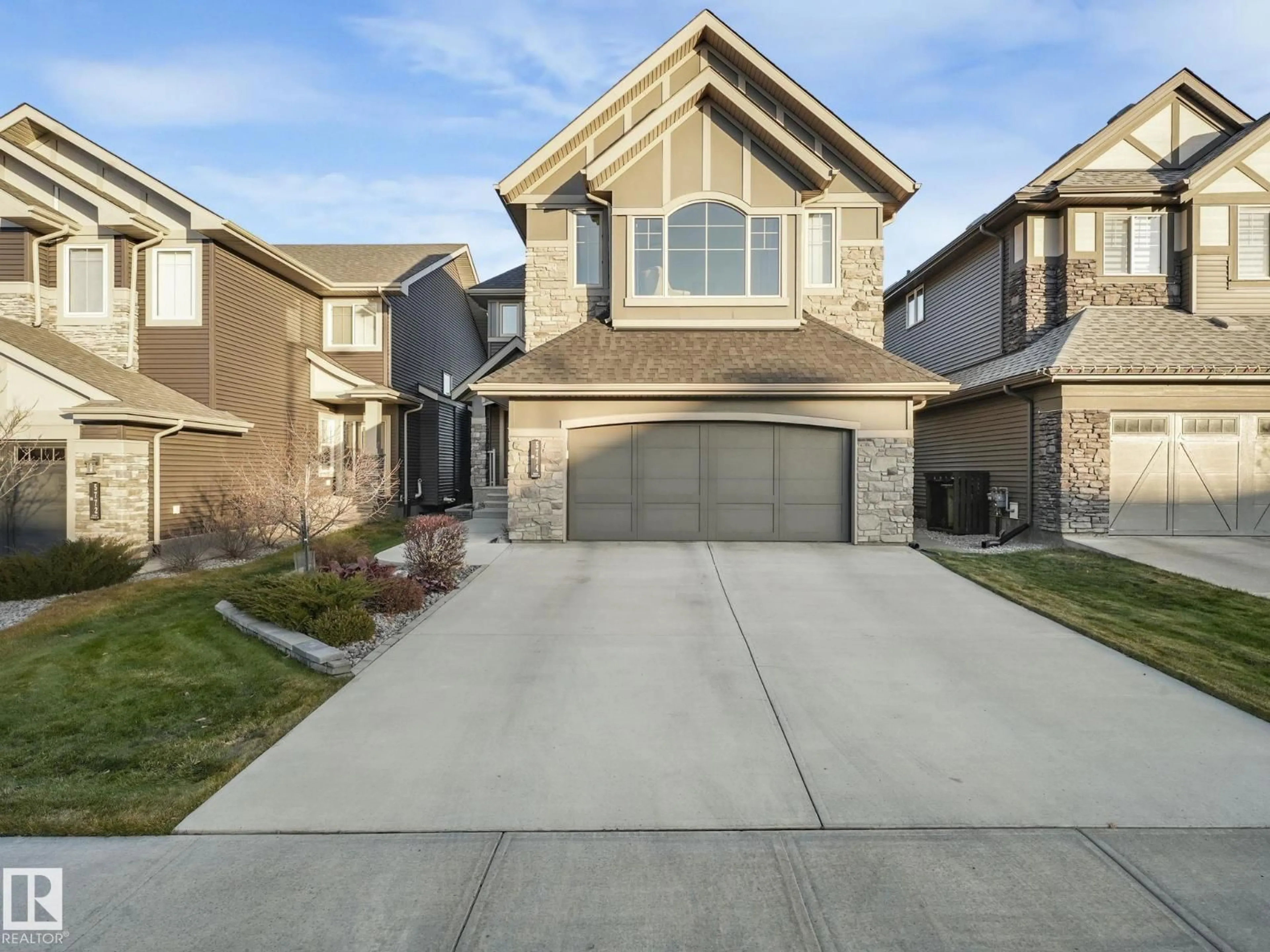 Home with vinyl exterior material, street for 5774 KEEPING CR, Edmonton Alberta T6W0S5