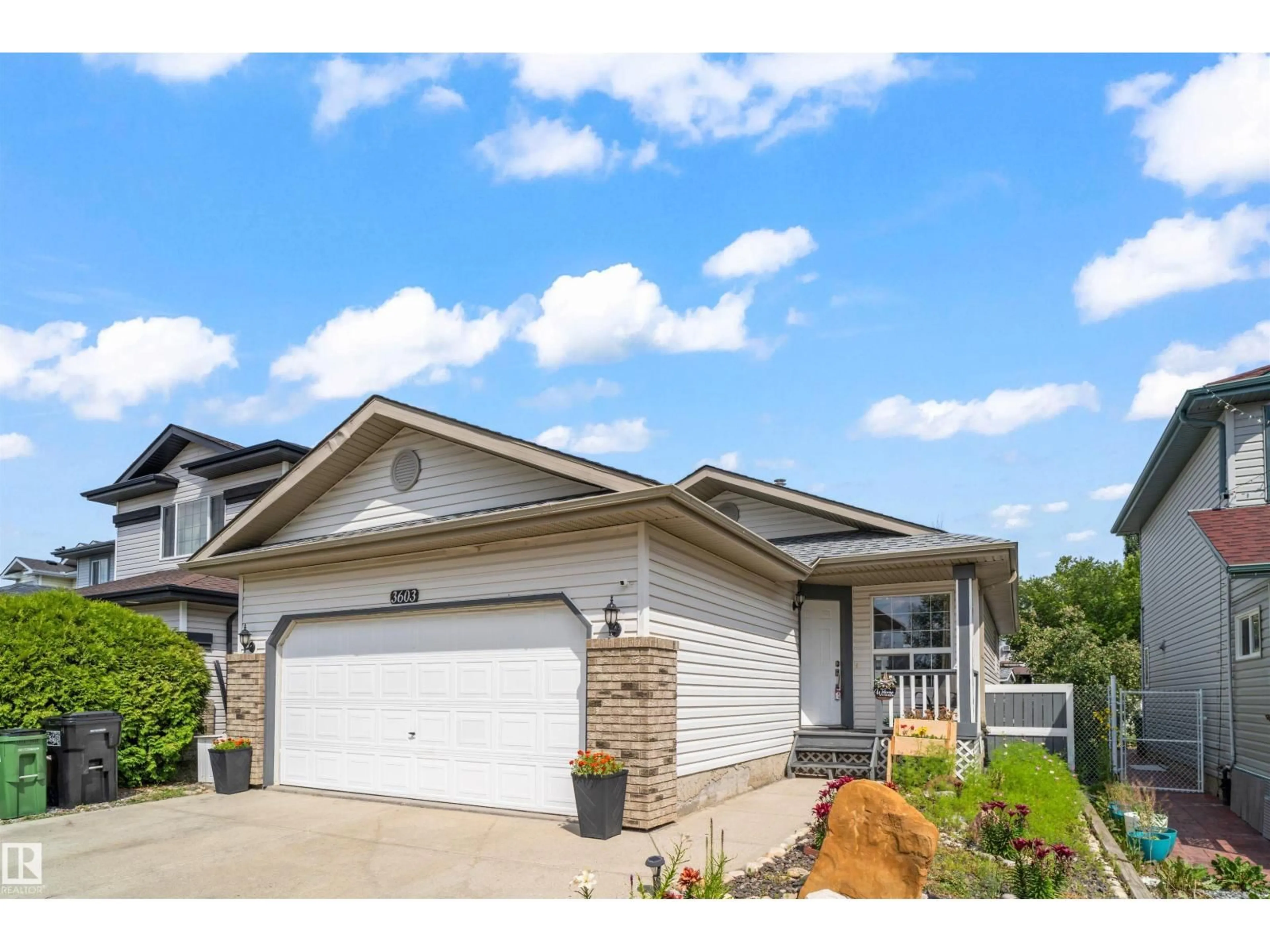 Home with vinyl exterior material, street for 3603 23 ST, Edmonton Alberta T6T1W2