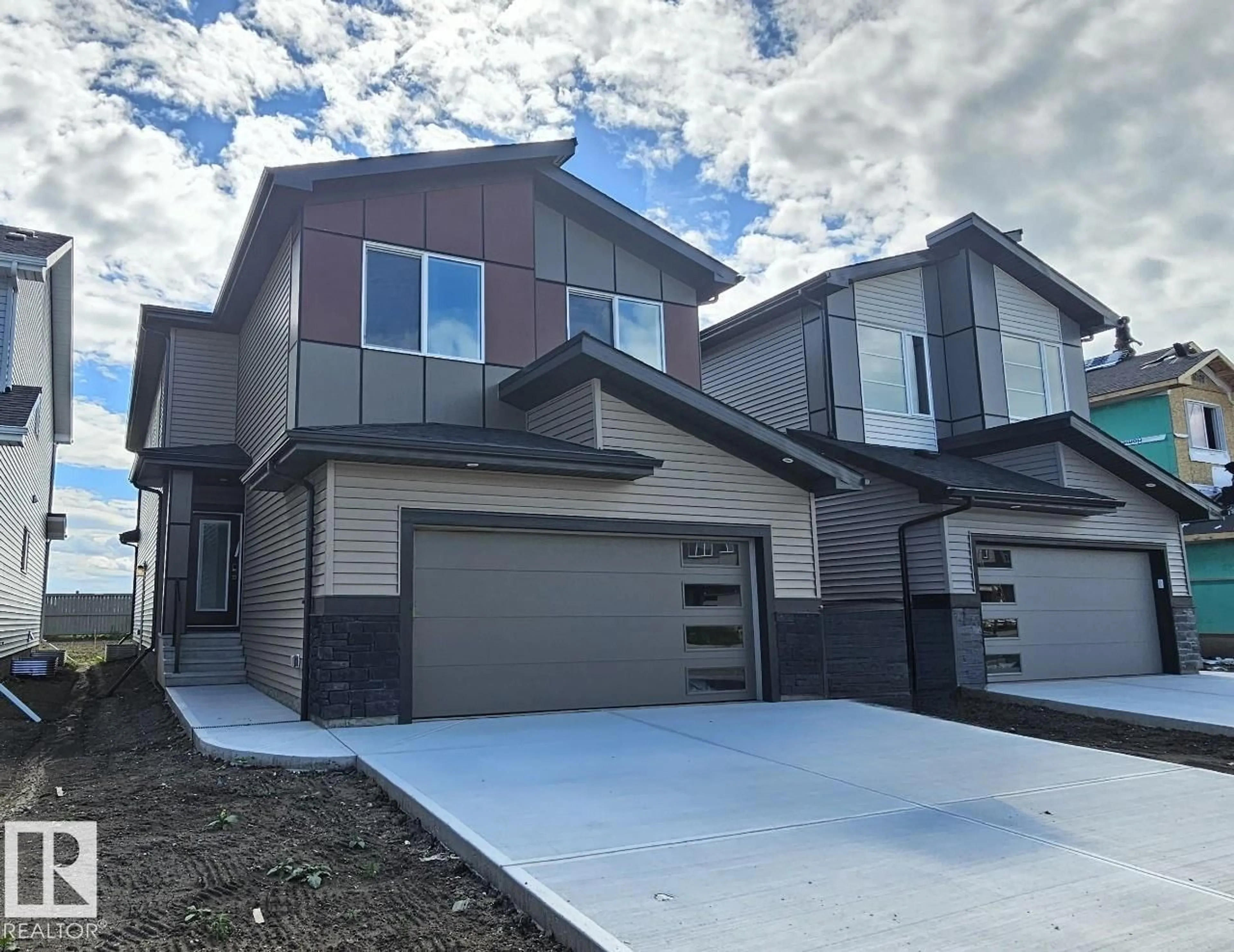 Home with vinyl exterior material, street for 7207 182 AV, Edmonton Alberta T5Z0J1