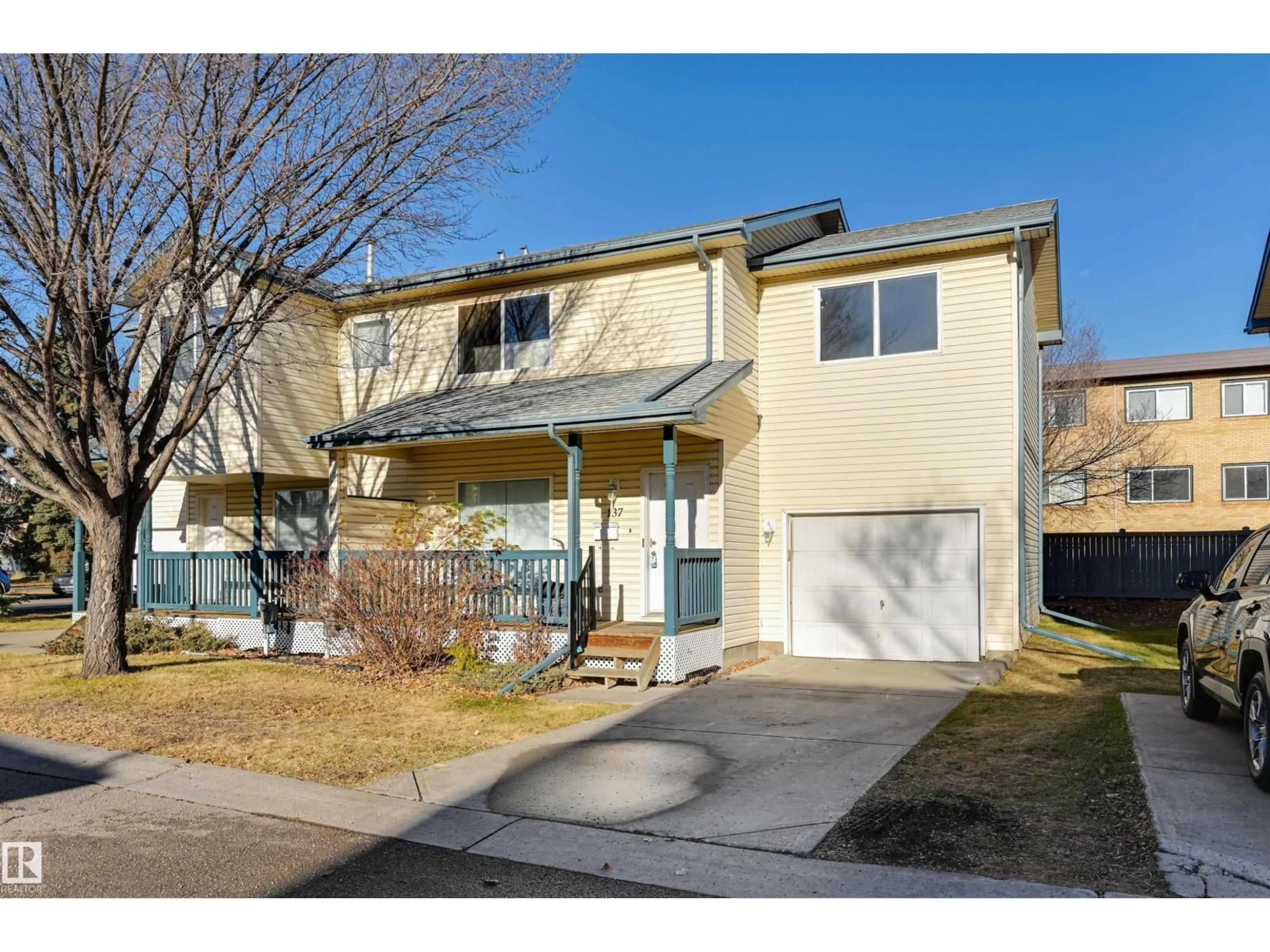Home with vinyl exterior material, street for #137 - 10909 106 ST, Edmonton Alberta T5H4M7