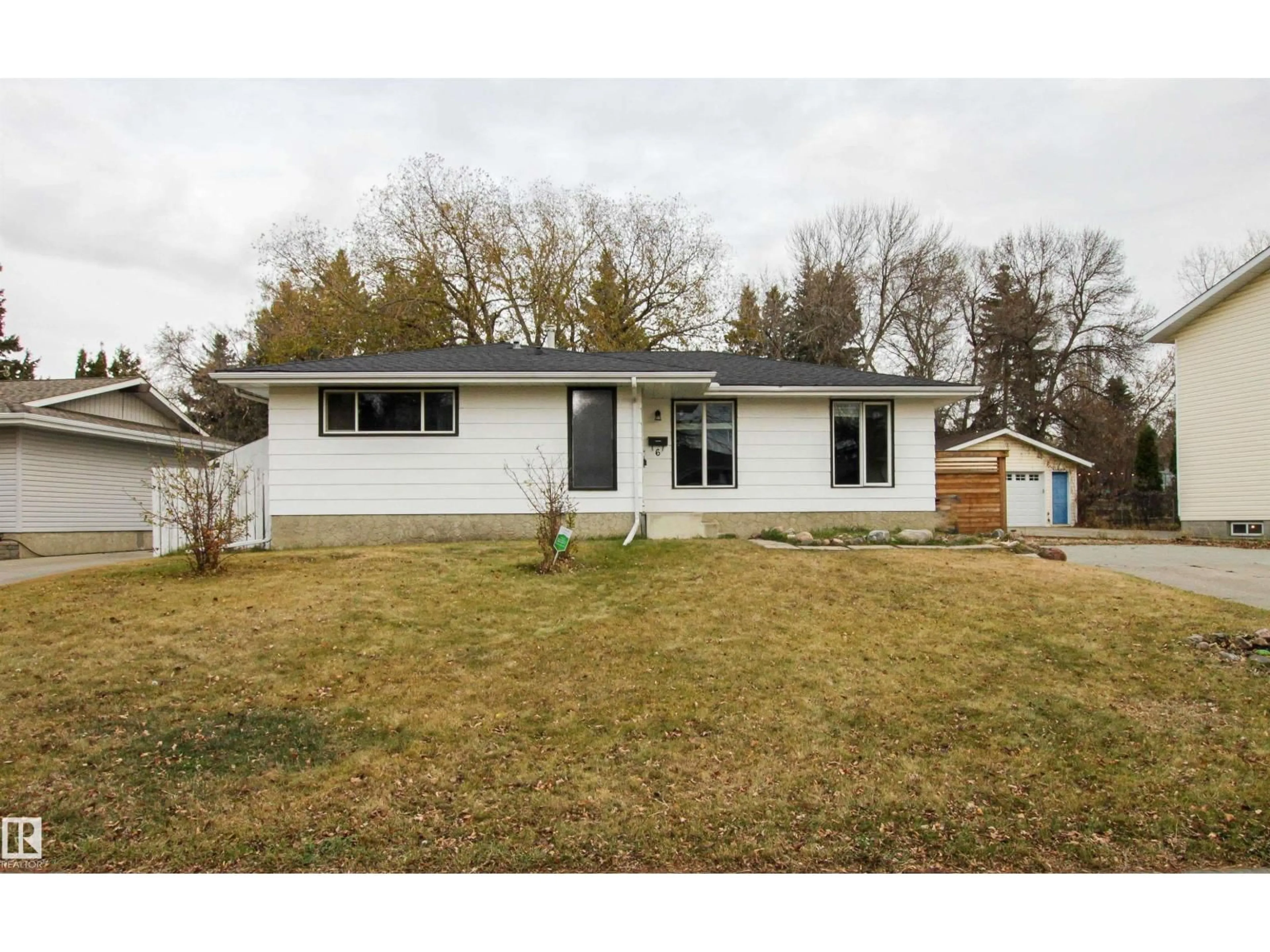 Home with vinyl exterior material, street for 6 MARKET ST, Sherwood Park Alberta T8A0T6