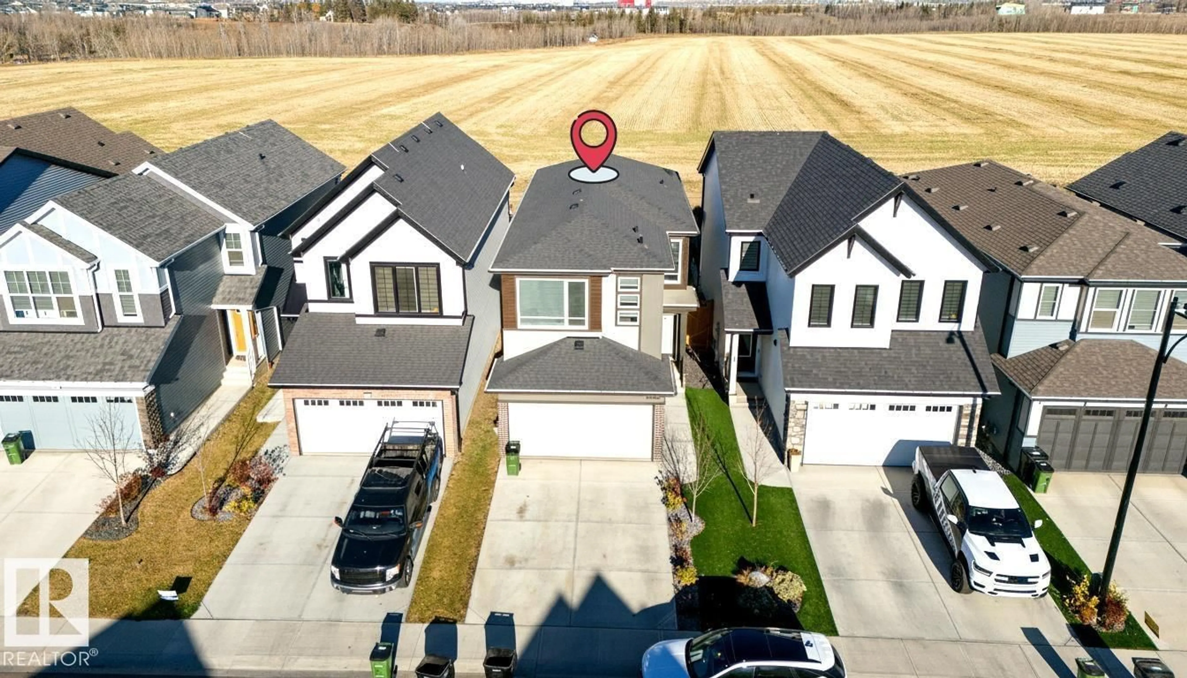 A pic from outside/outdoor area/front of a property/back of a property/a pic from drone, street for SW SW - 3443 CRAIG LD, Edmonton Alberta T6W5B3