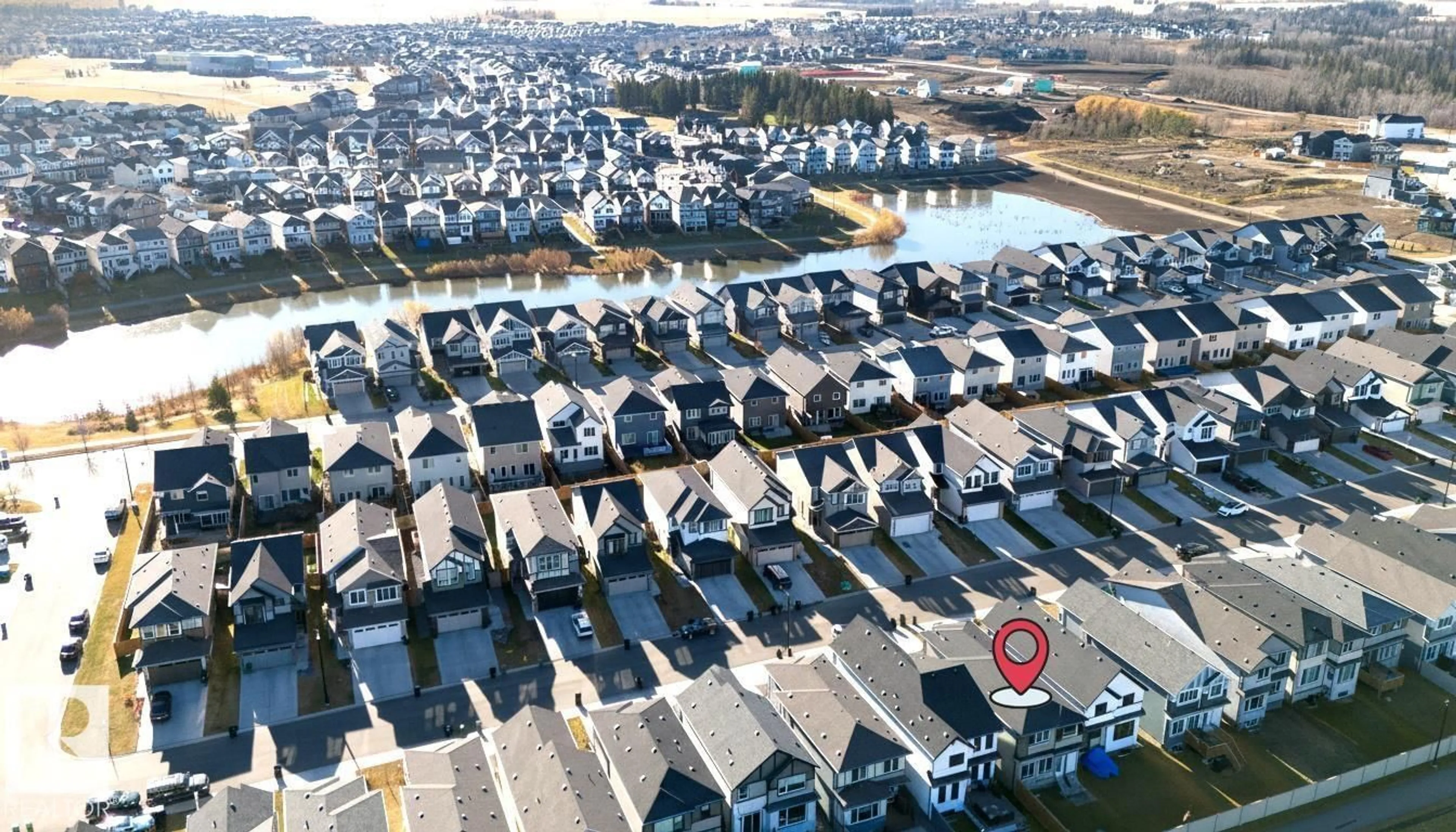 A pic from outside/outdoor area/front of a property/back of a property/a pic from drone, street for SW SW - 3443 CRAIG LD, Edmonton Alberta T6W5B3