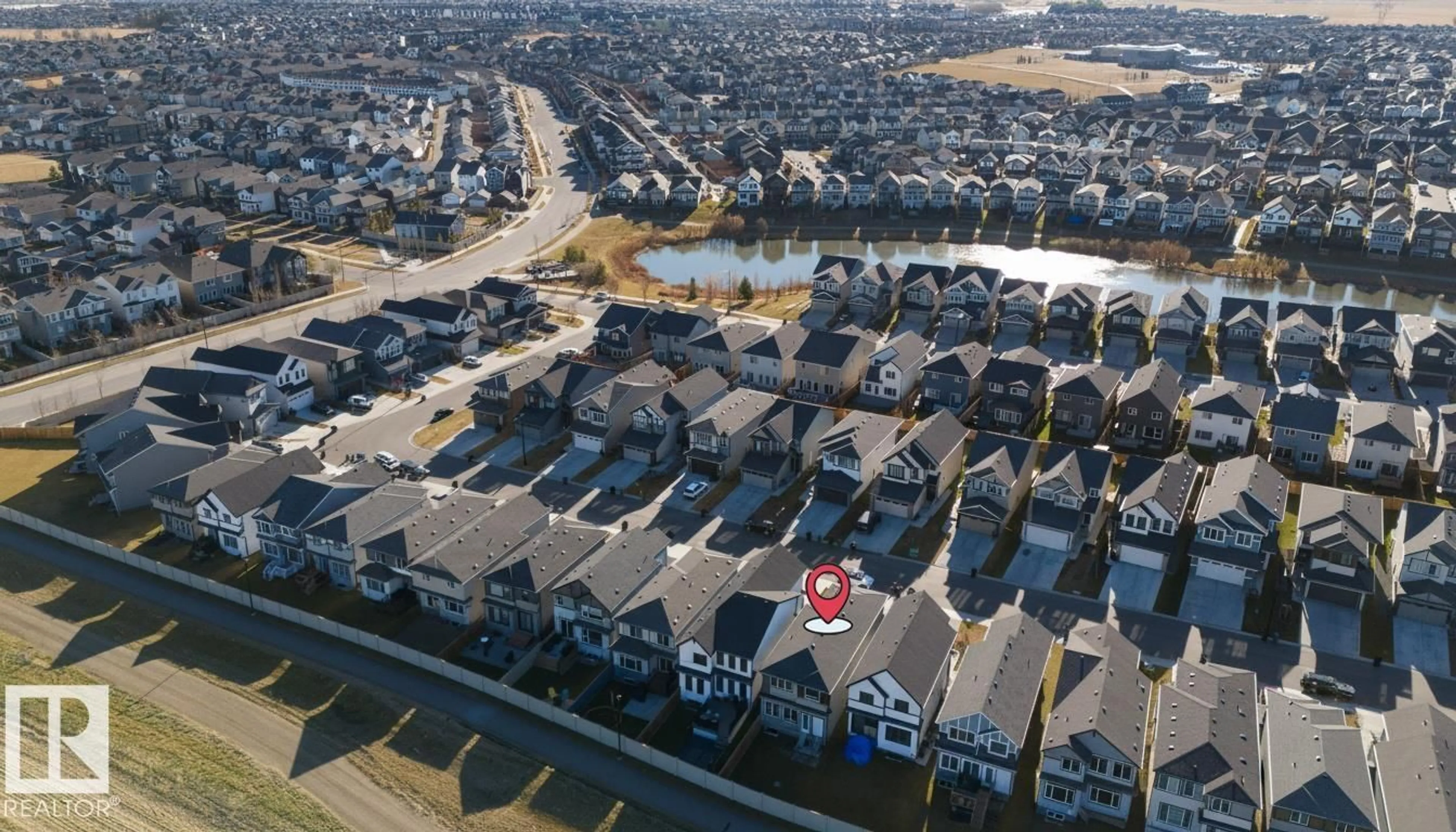 A pic from outside/outdoor area/front of a property/back of a property/a pic from drone, street for SW SW - 3443 CRAIG LD, Edmonton Alberta T6W5B3