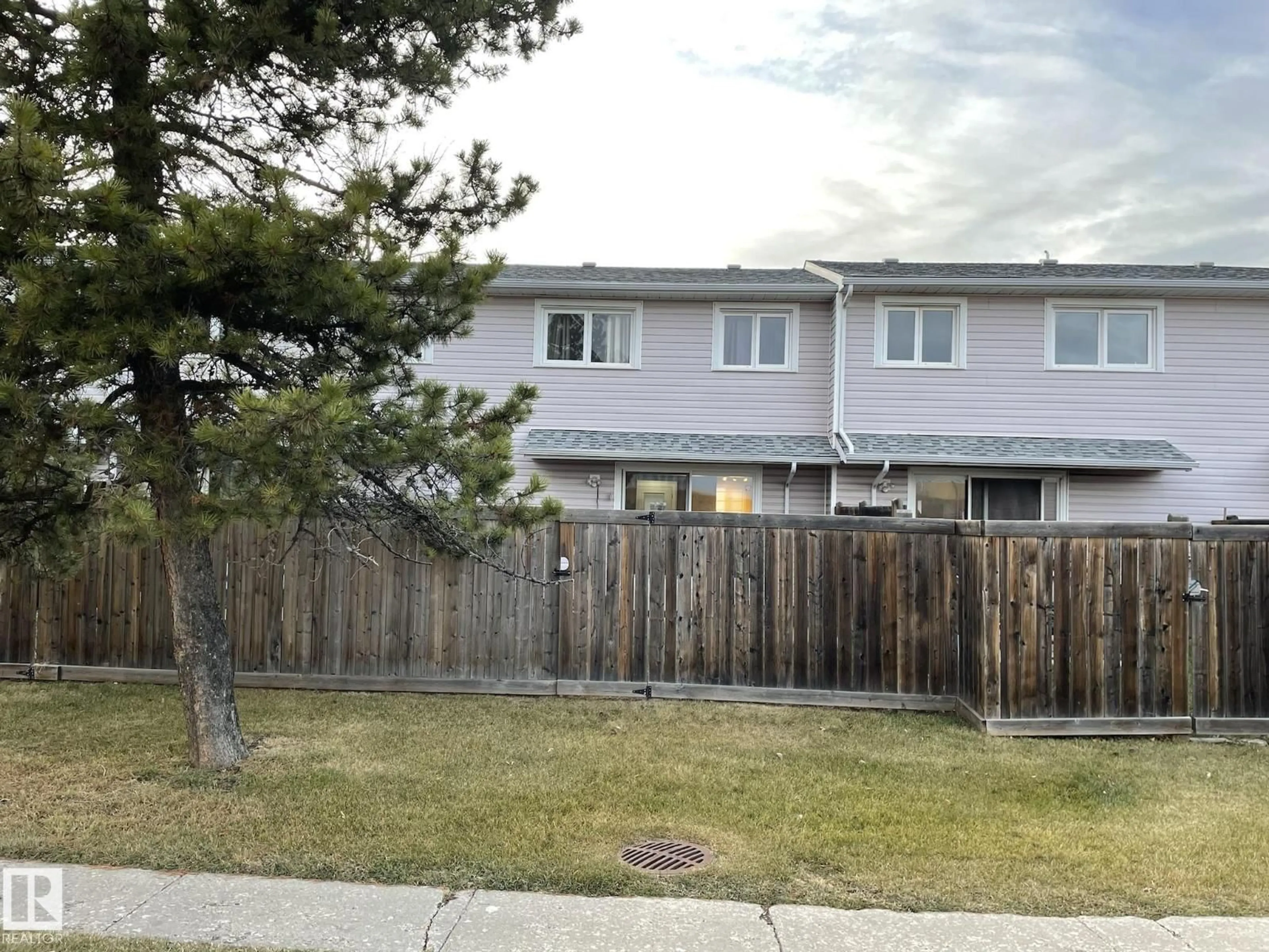 A pic from outside/outdoor area/front of a property/back of a property/a pic from drone, street for 18323 66 AV, Edmonton Alberta T5T1Z5