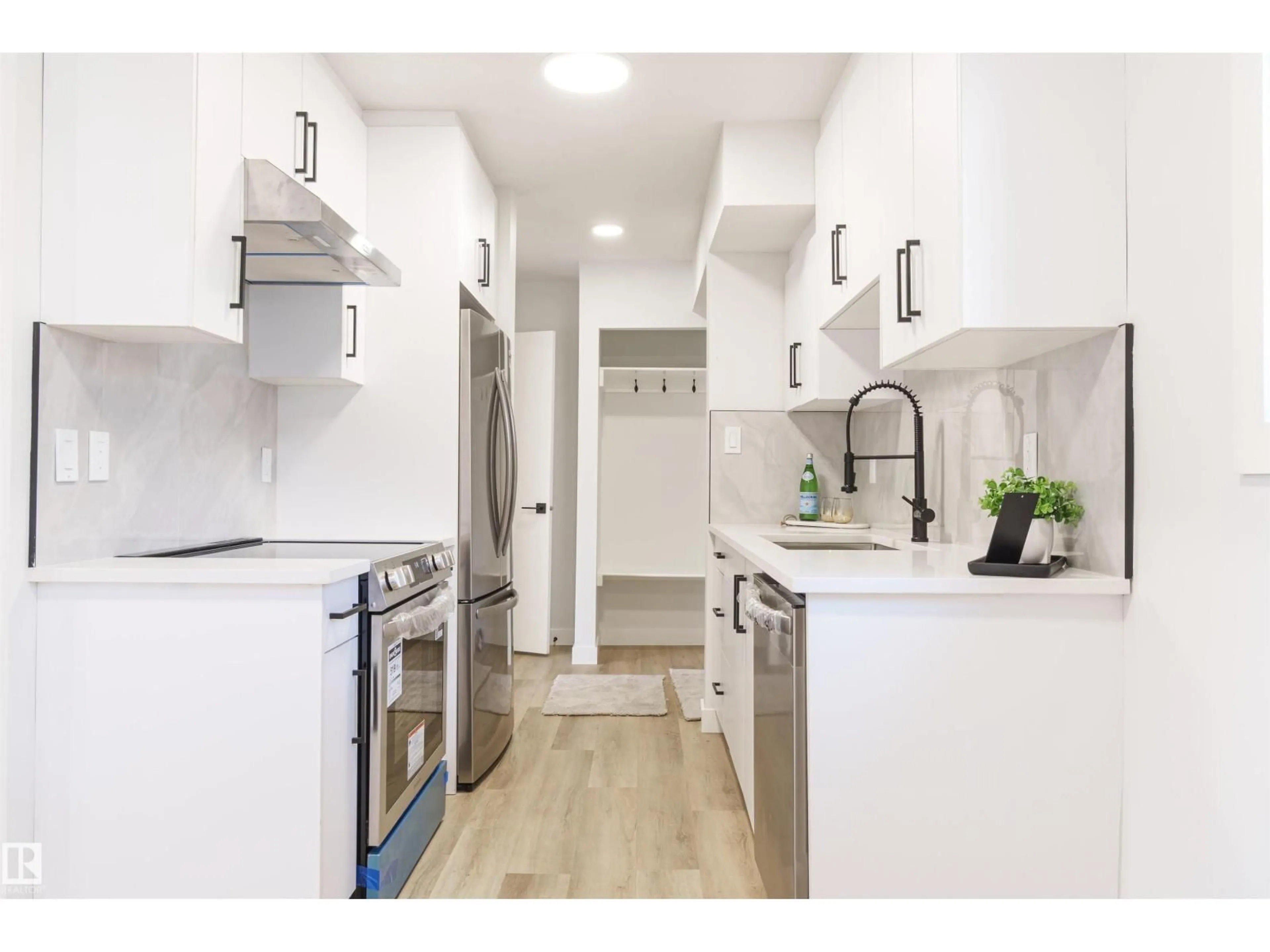 Open concept kitchen, ceramic/tile floor for NW - 18418 62B AV, Edmonton Alberta T5T2N7