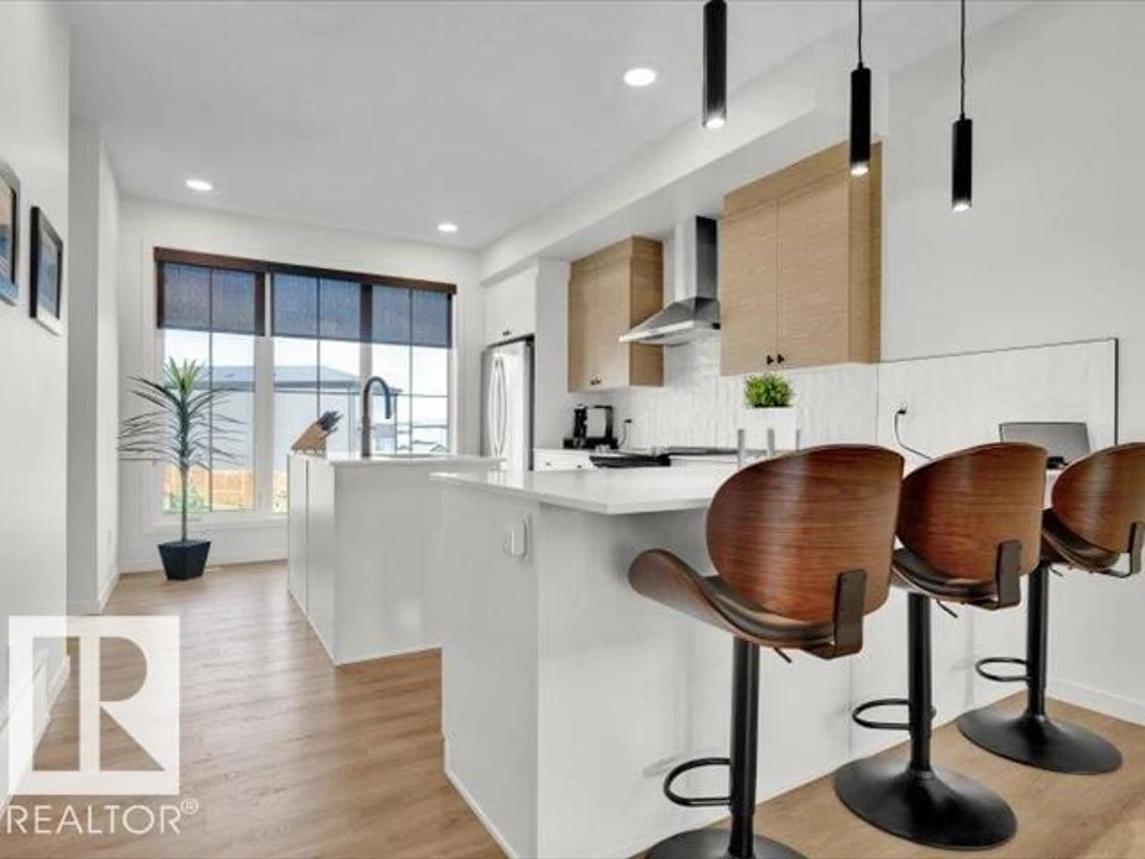 Open concept kitchen, wood/laminate floor for SW - 439 39 ST, Edmonton Alberta T6X2X9