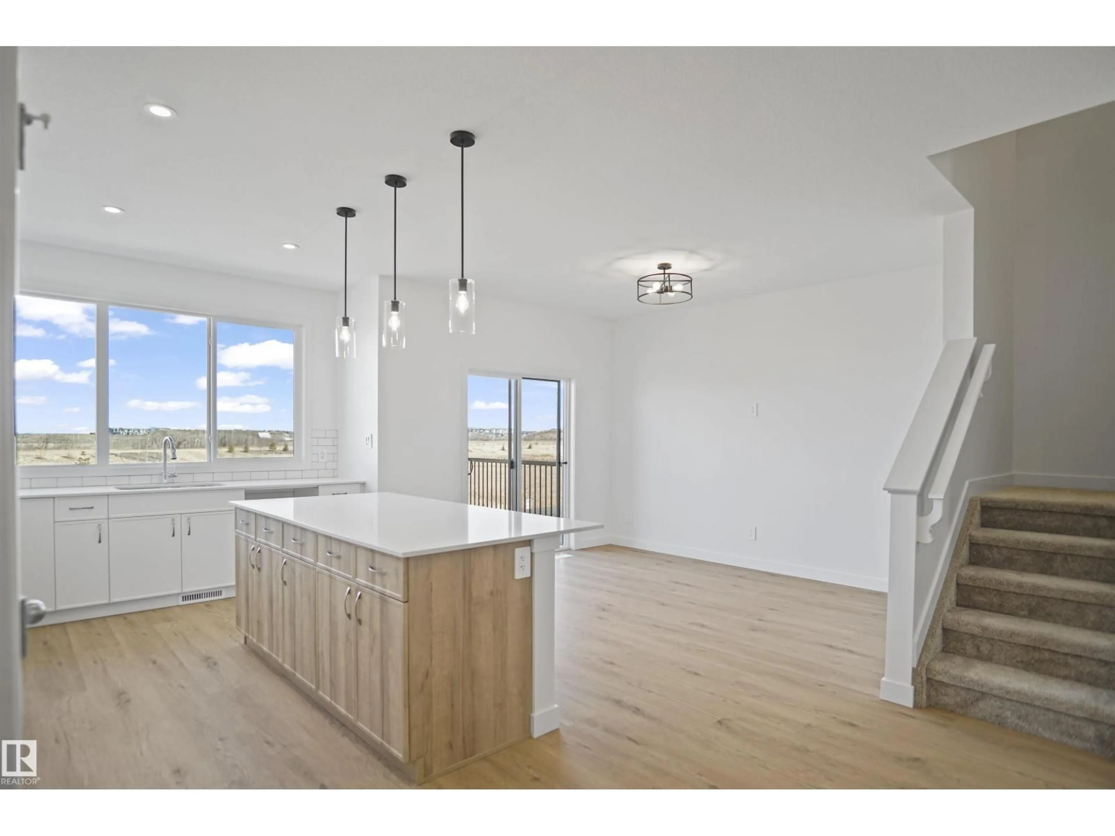 Open concept kitchen, wood/laminate floor for 1165 SOUTH CREEK WD, Stony Plain Alberta T7Z0P1