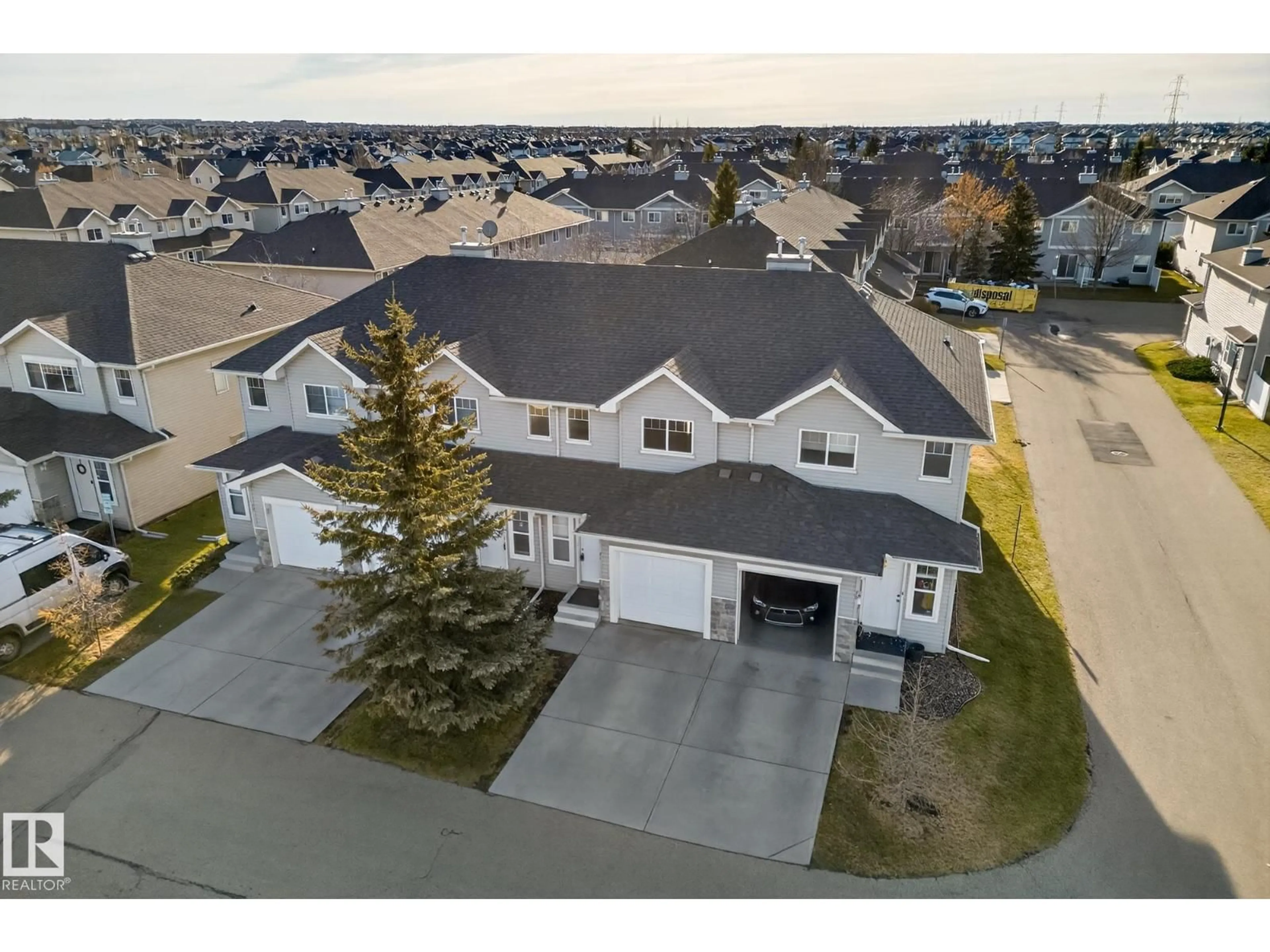 A pic from outside/outdoor area/front of a property/back of a property/a pic from drone, street for 230 - 71 EDWARDS DR, Edmonton Alberta T6X1G7