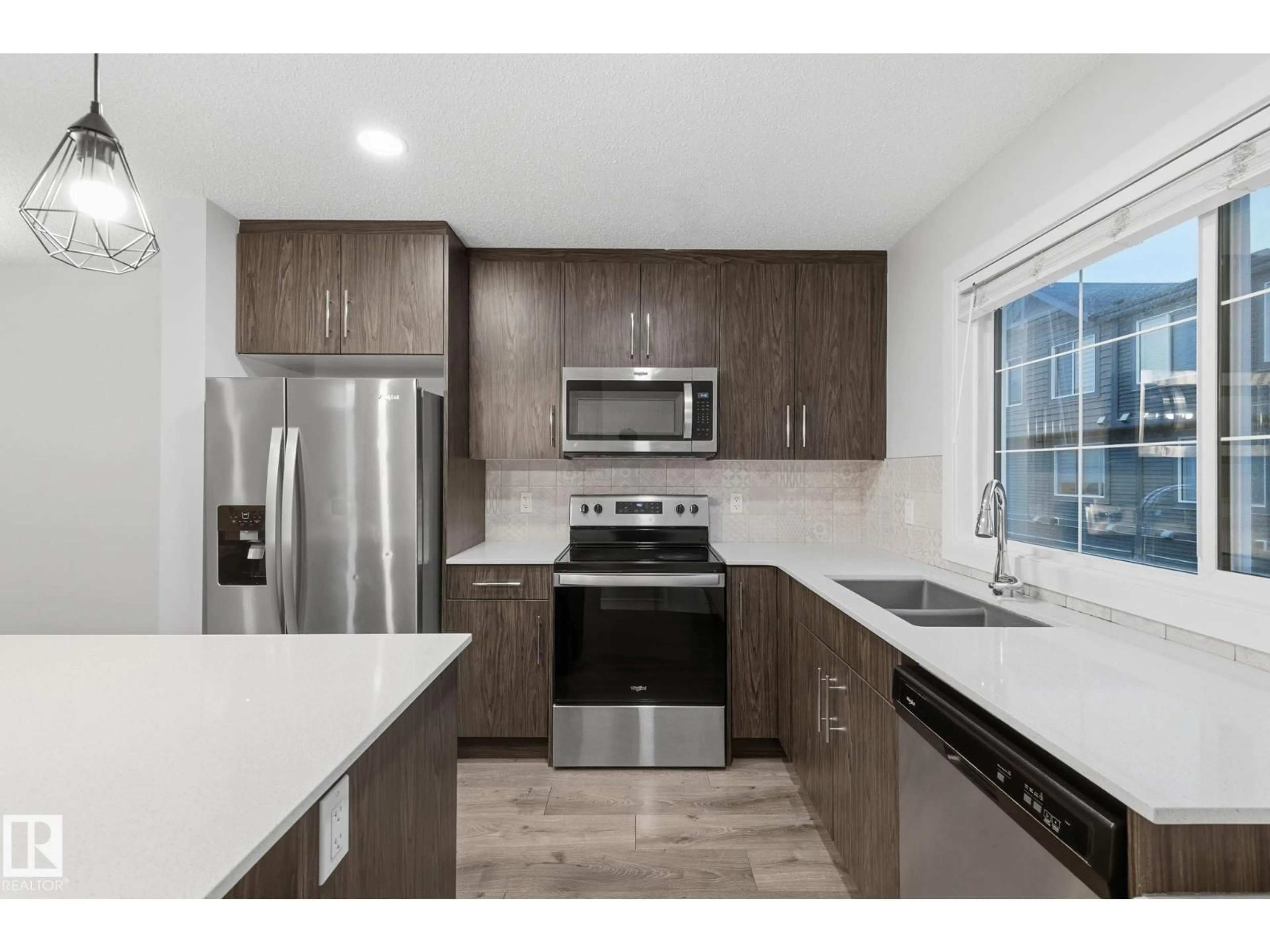 Standard kitchen, ceramic/tile floor for #38 - 3025 151 AV, Edmonton Alberta T5Y3W4