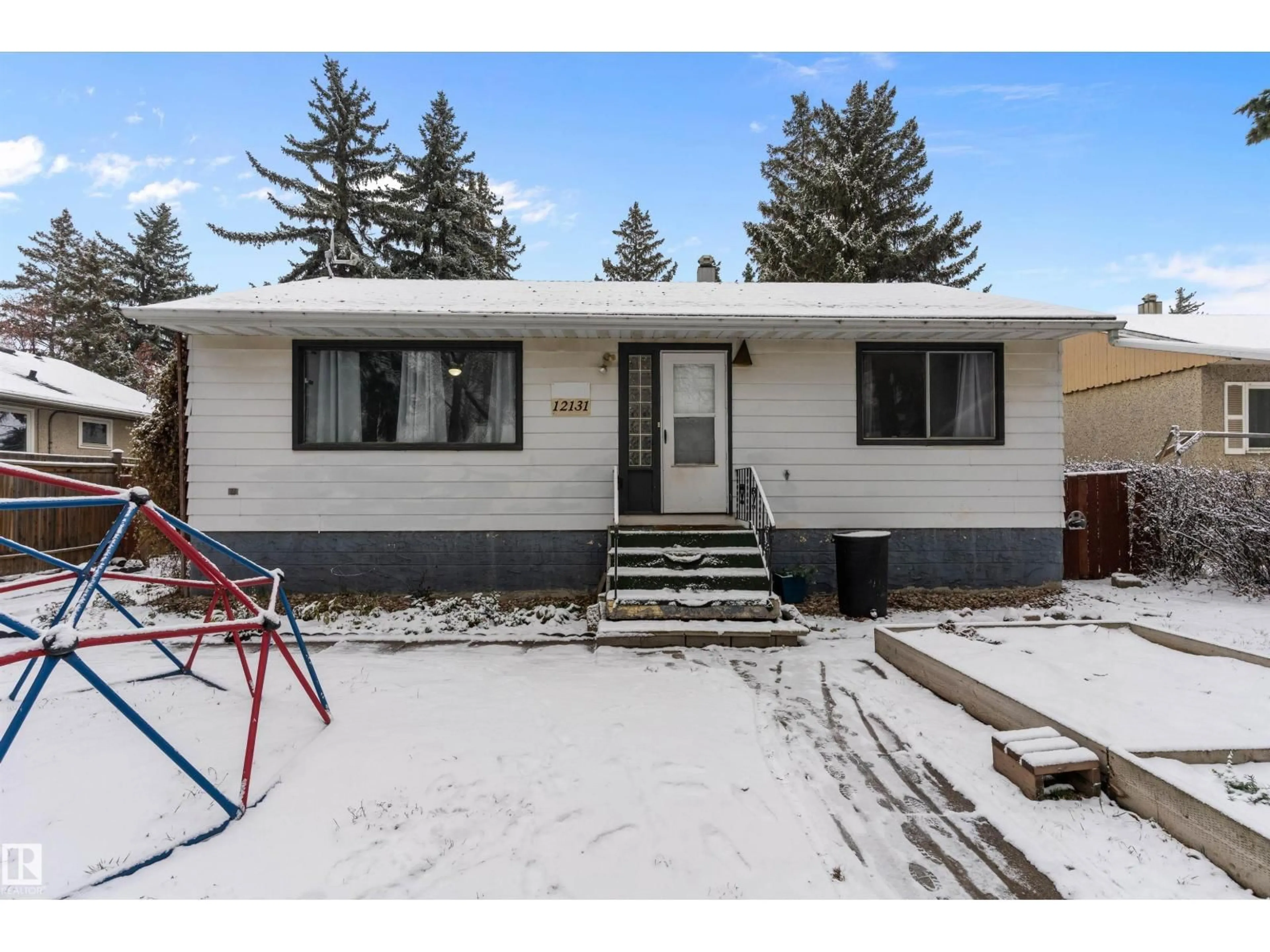 Home with vinyl exterior material, street for NW - 12131 141 ST, Edmonton Alberta T5L2G1