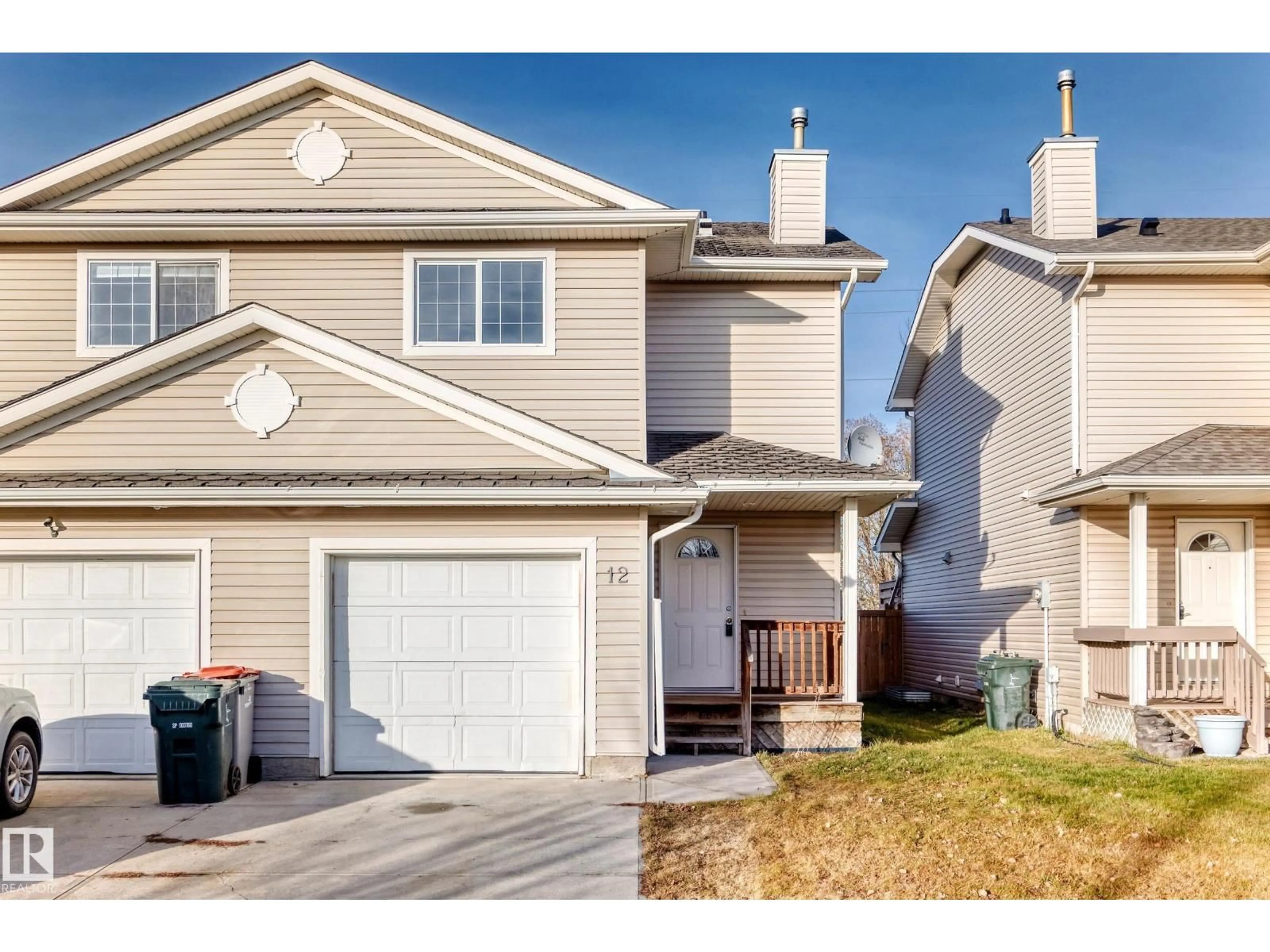 Home with vinyl exterior material, street for 12 GRAYWOOD TC, Stony Plain Alberta T7T0A6