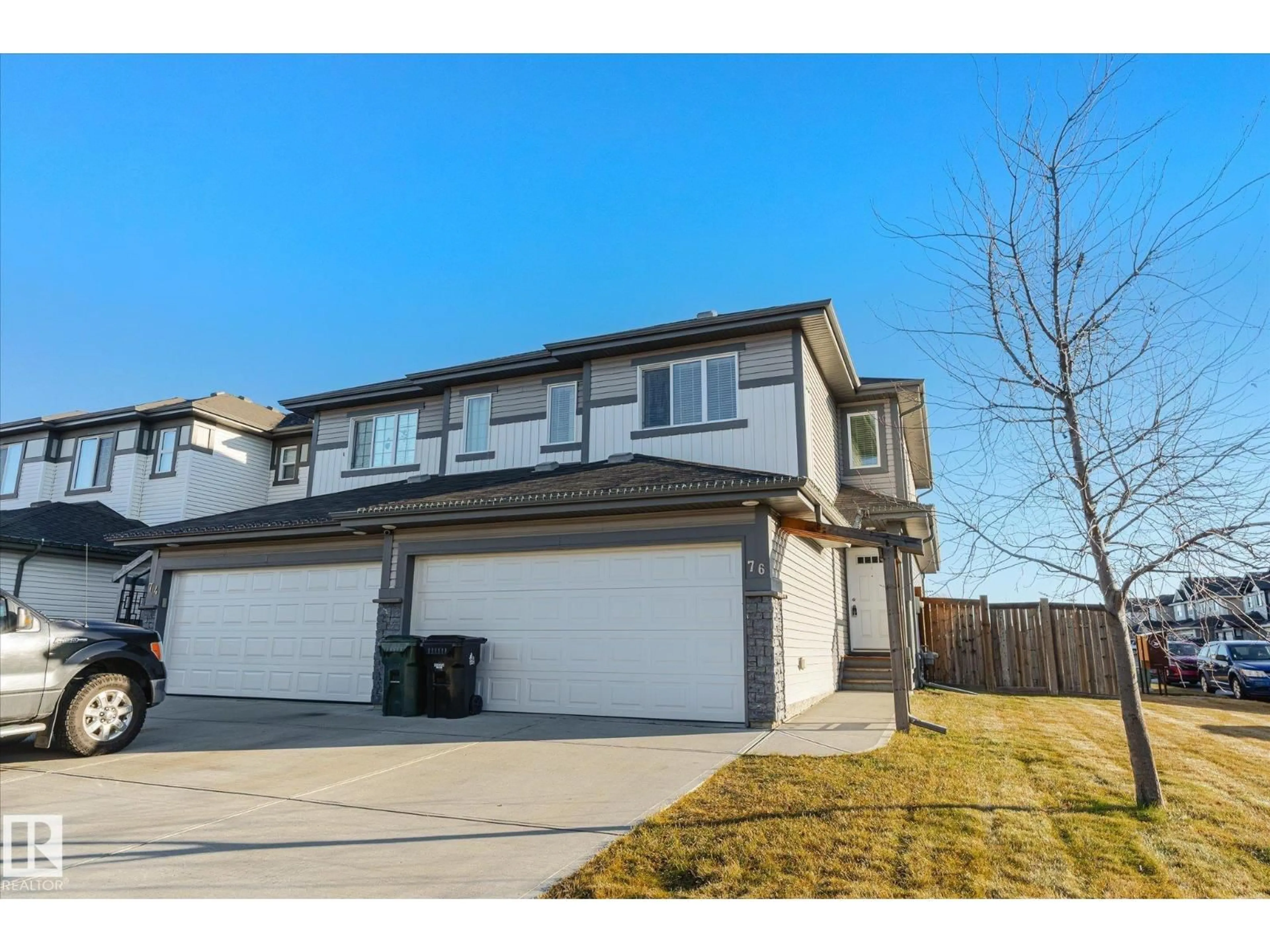 A pic from outside/outdoor area/front of a property/back of a property/a pic from drone, street for 76 SPRINGWOOD WY, Spruce Grove Alberta T7X0S8