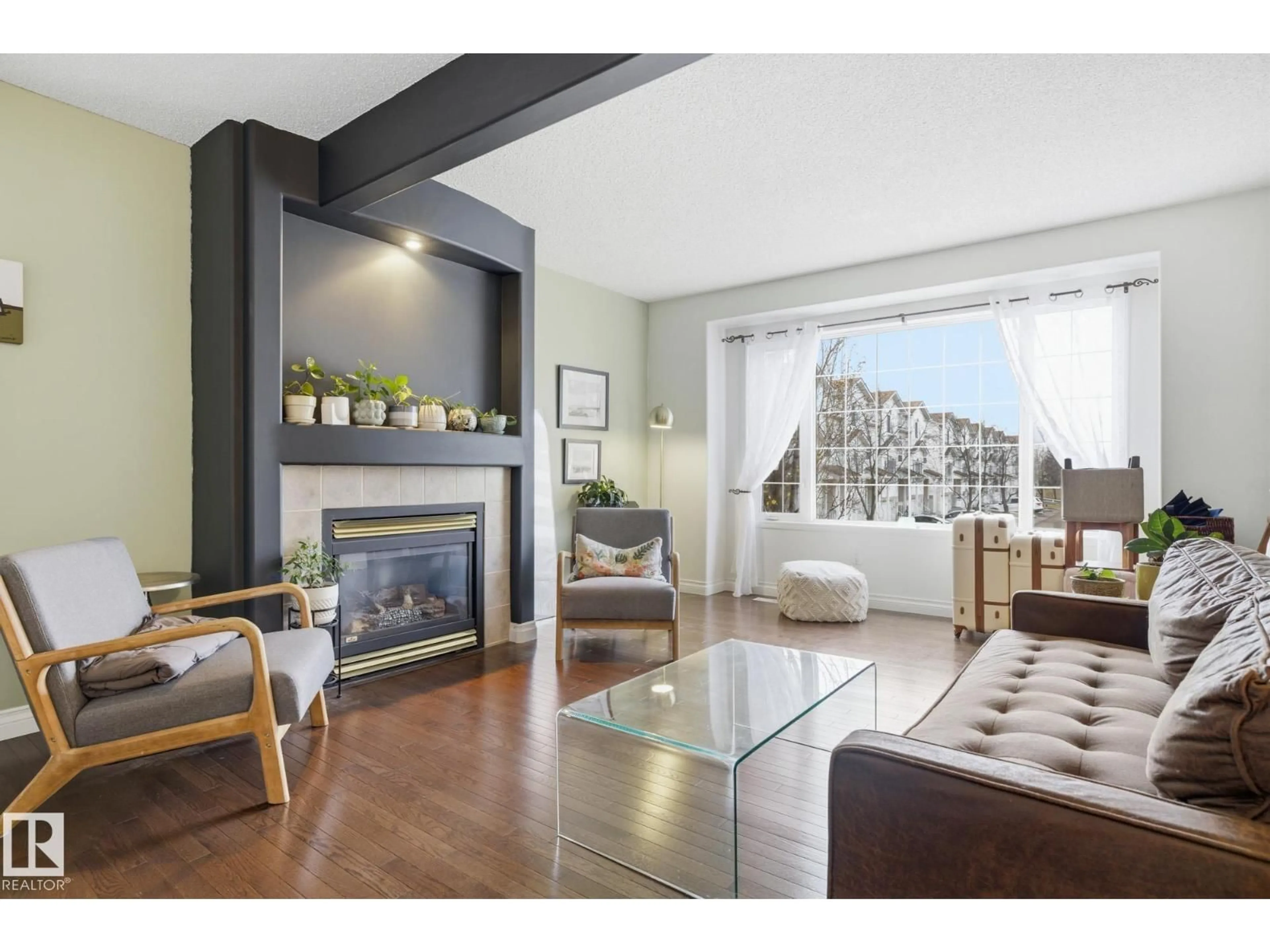 Living room with furniture, wood/laminate floor for 17 - 9935 167 ST, Edmonton Alberta T5P4Y6