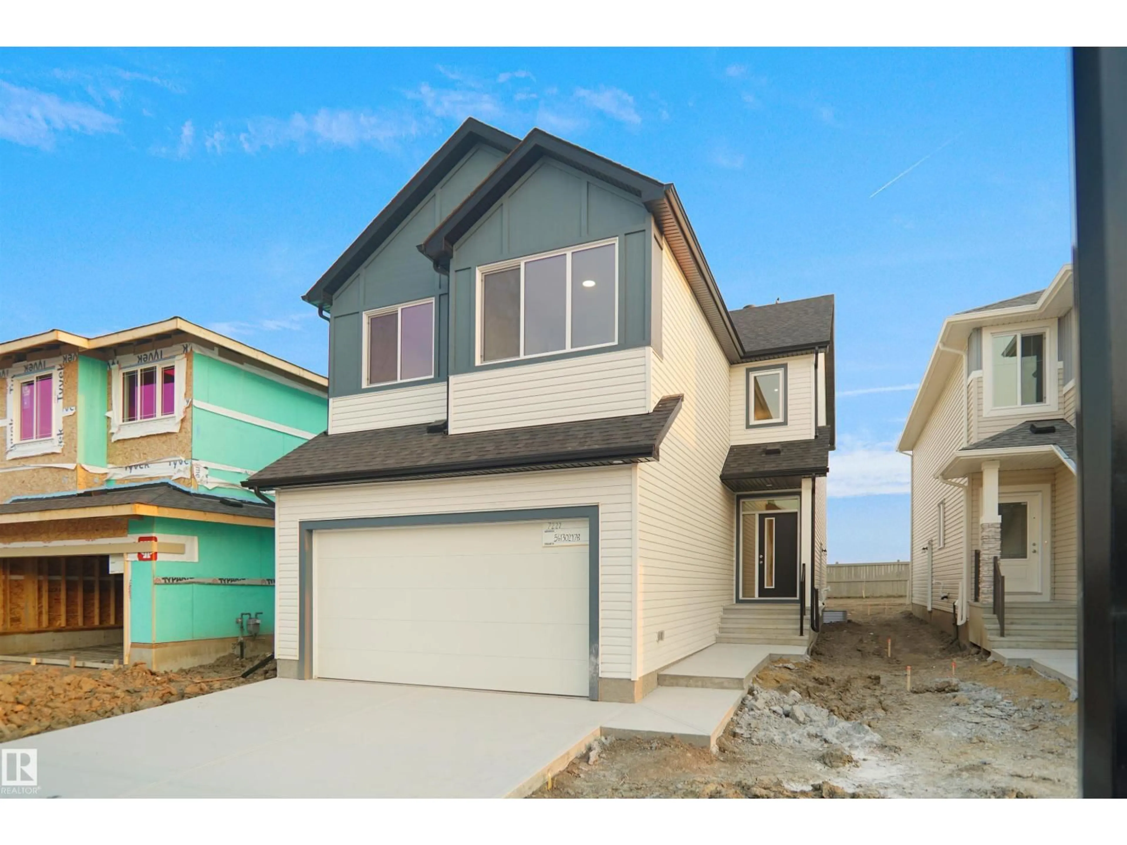 Home with vinyl exterior material, street for 7227 182 AV, Edmonton Alberta T5Z0V6