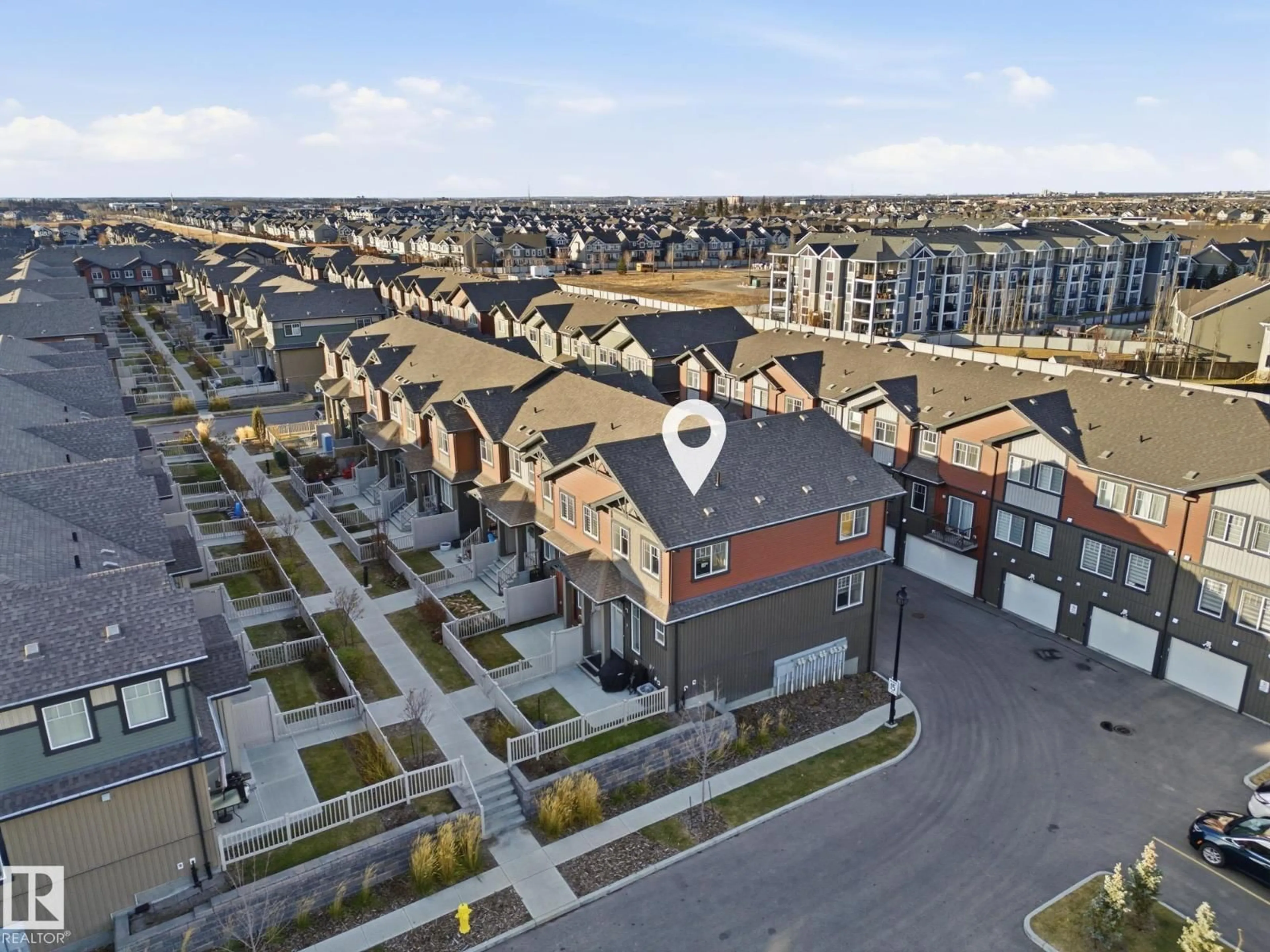 A pic from outside/outdoor area/front of a property/back of a property/a pic from drone, unknown for #111 - 3305 ORCHARDS LINK LI, Edmonton Alberta T6X2H1